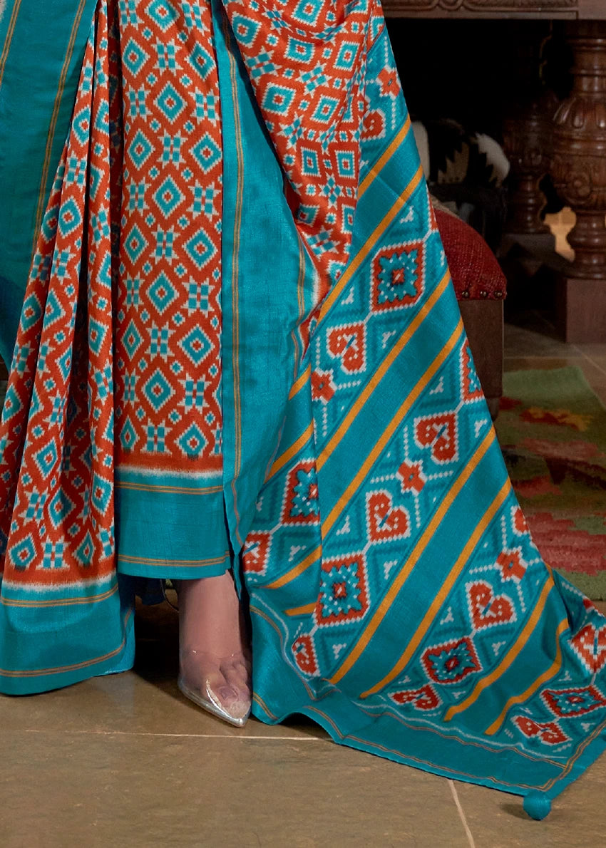 Designer Rust Orange and Turquoise Blue Patola Silk Saree