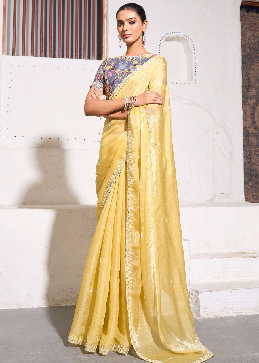 Crushed Tissue Yellow Embroidered Saree & Grey Printed Blouse