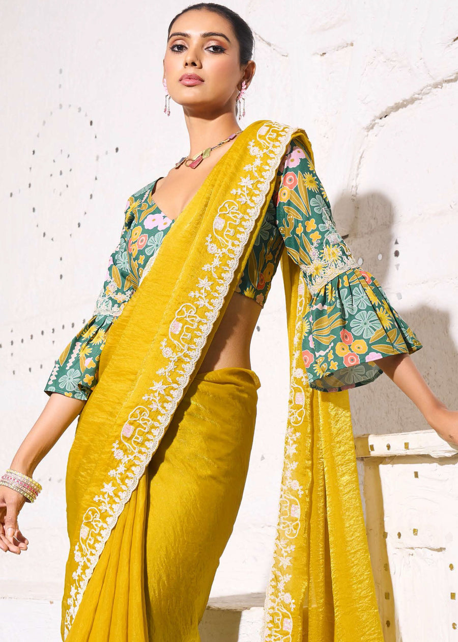 Crushed Tissue Yellow Embroidered Saree & Green Printed Blouse