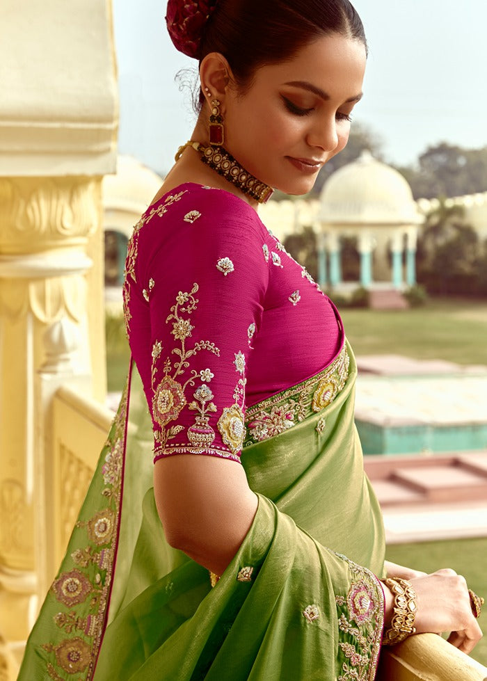 Green Organza Tissue Silk Embroidered Saree With Contrast Pink Blouse