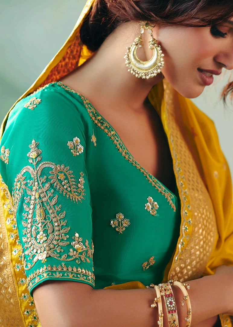 Yellow Banarasi Silk Bridal Saree & Green Embroidered Blouse