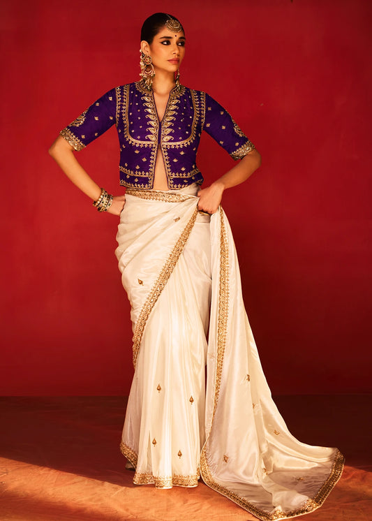 Off White Silk Embroidered Saree & Purple Blouse