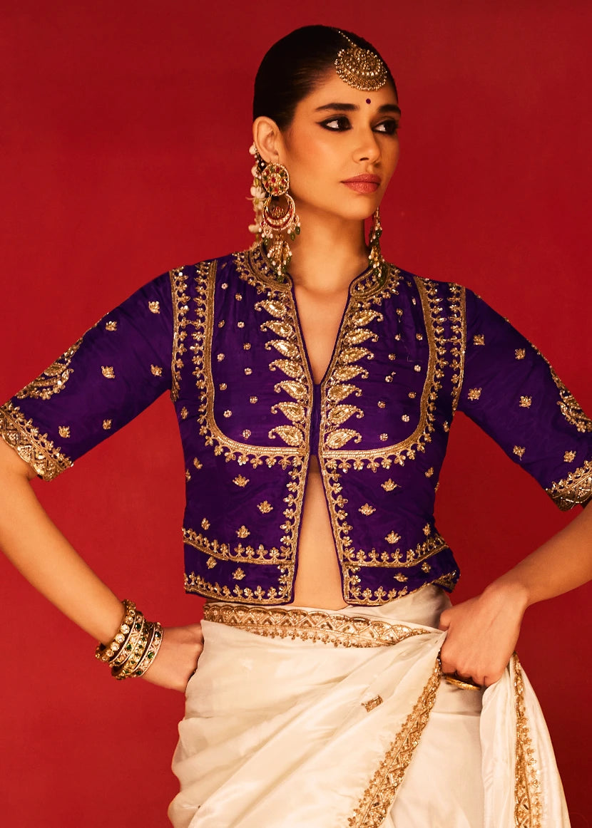 Off White Silk Embroidered Saree & Purple Blouse