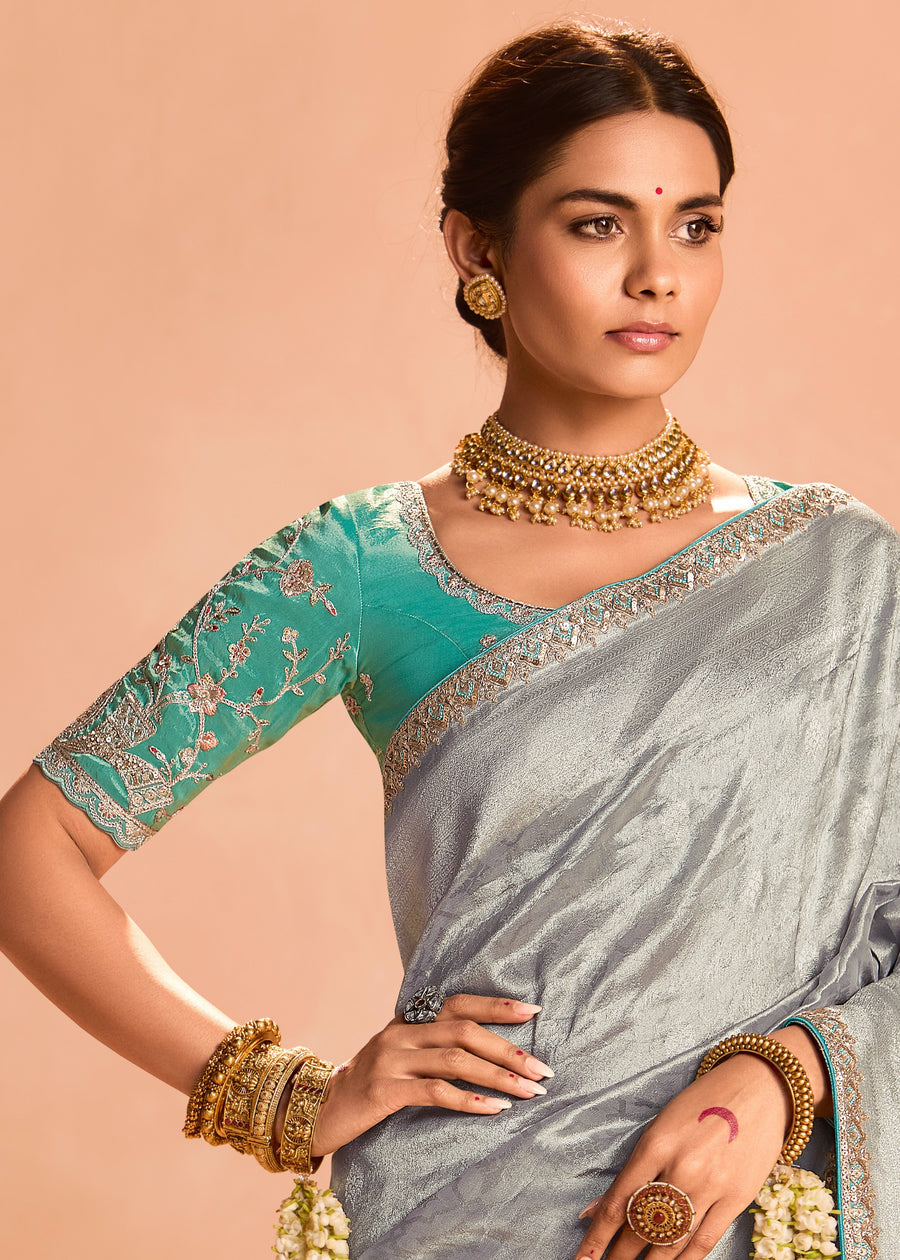 Pure Banarasi Tissue Silk Embroidered Silver Handloom Saree & Contrast Blue Blouse