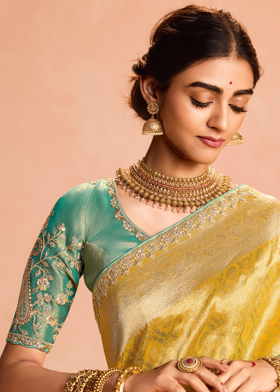 Pure Banarasi Tissue Silk Embroidered Yellow Handloom Saree & Contrast Blue Blouse