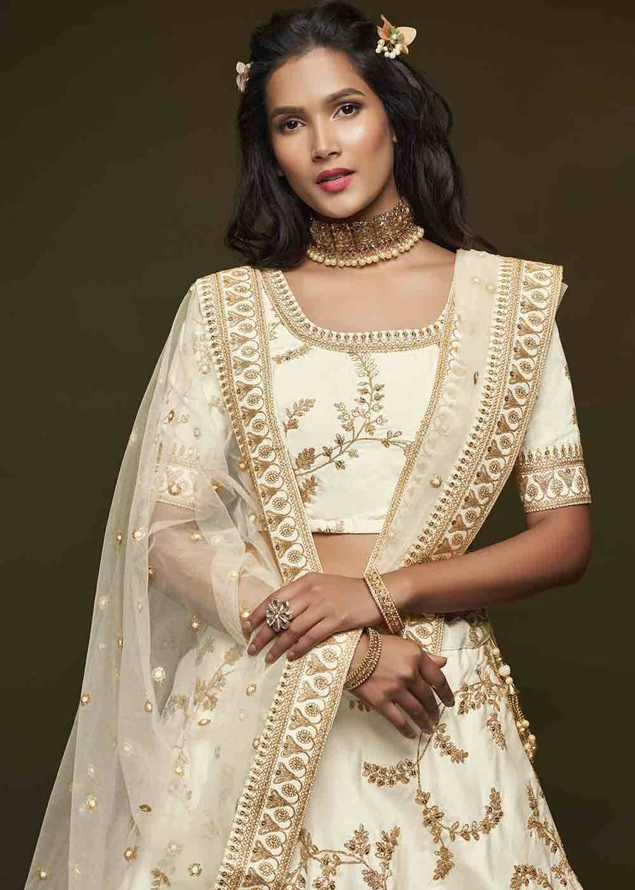 Off White Silk Bridesmaids Lehenga Choli With Zari Work