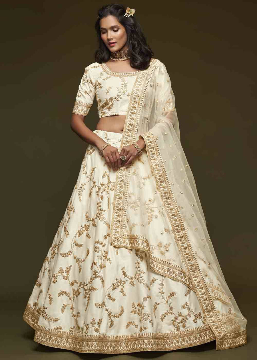 Off White Silk Bridesmaids Lehenga Choli With Zari Work