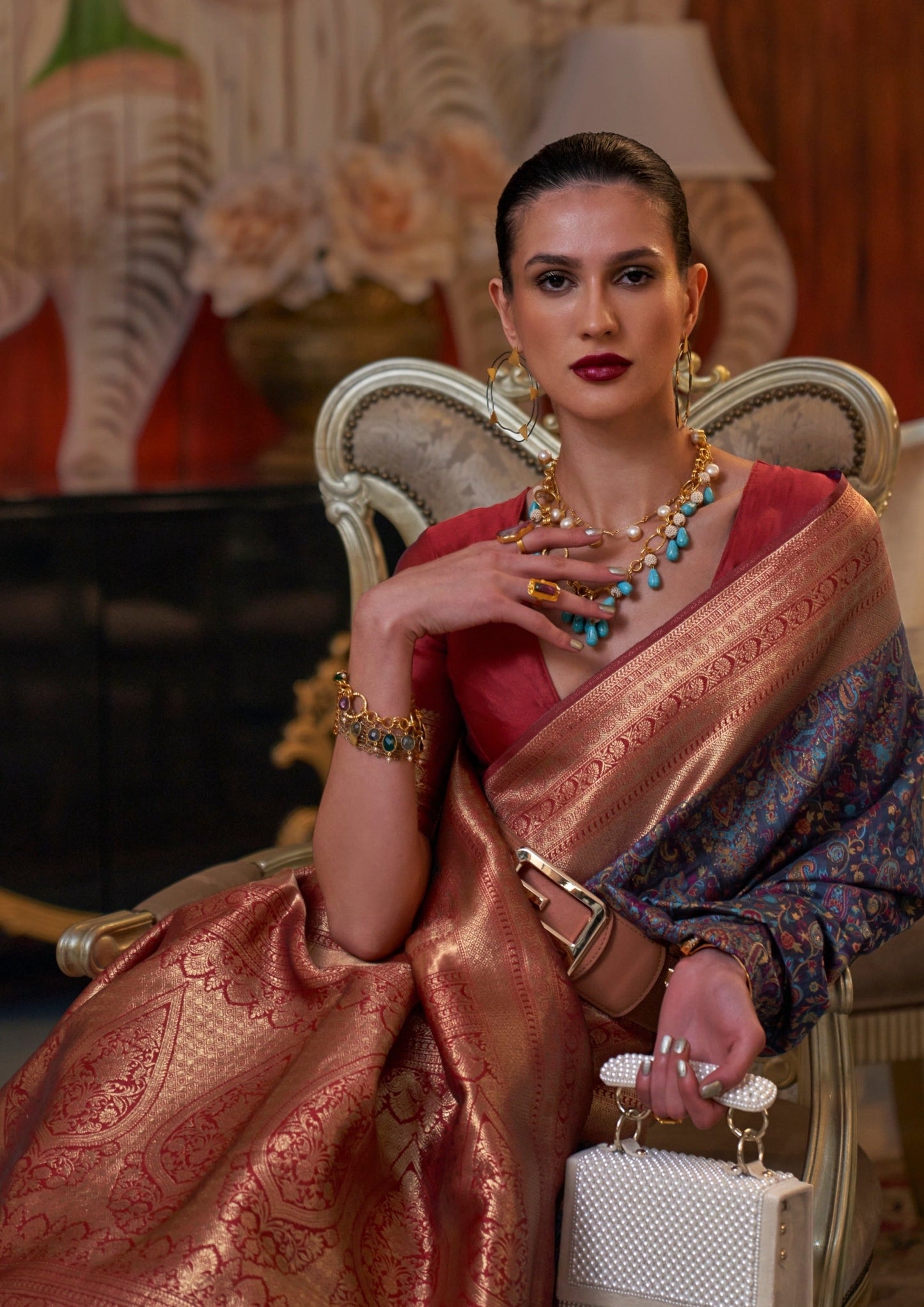 Blue handloom kashmiri banarasi saree design with red blouse.