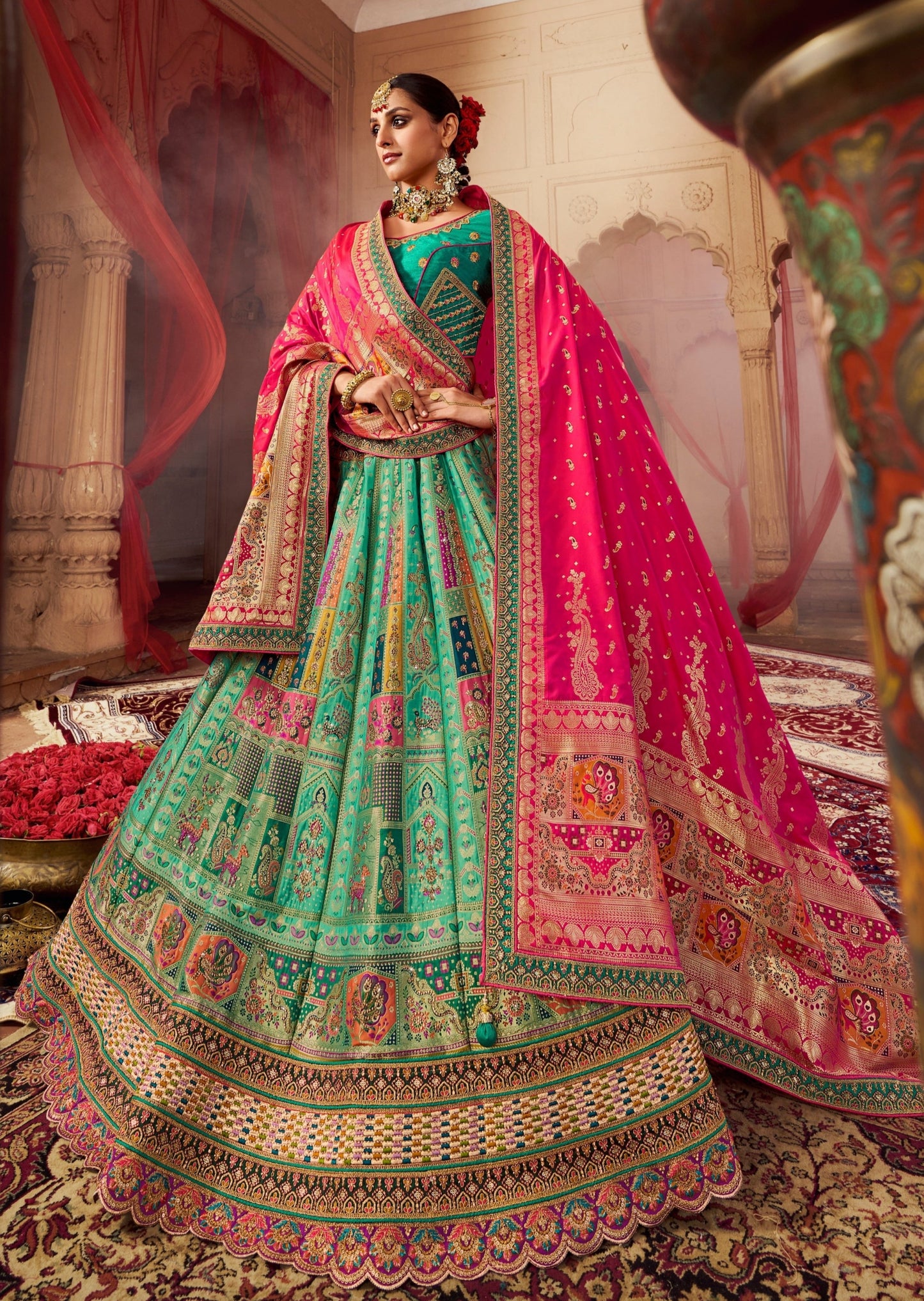 Bride in green banarasi silk lehenga choli with dupatta.