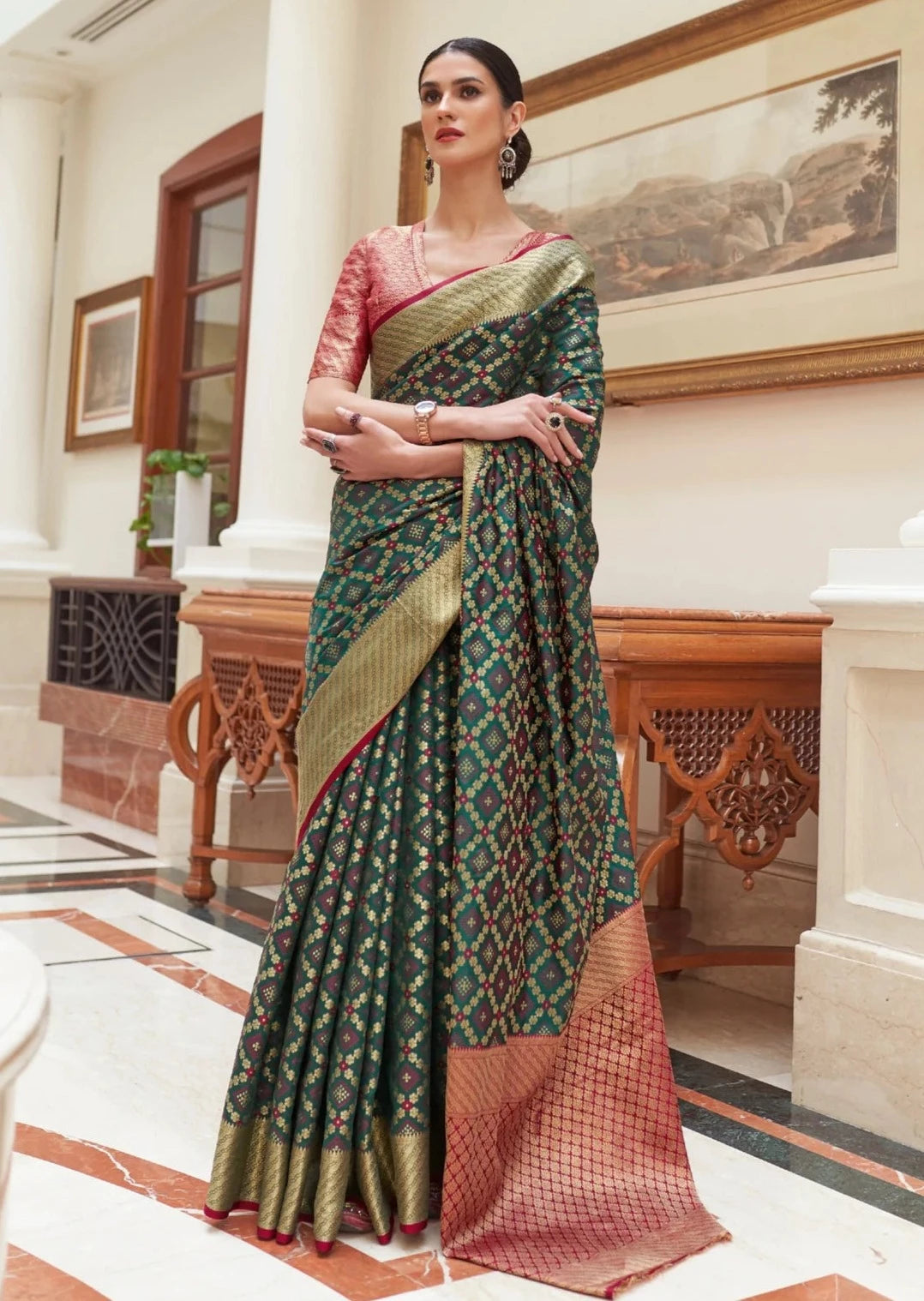 Banarasi silk forest green bandhani saree contrast red blouse.