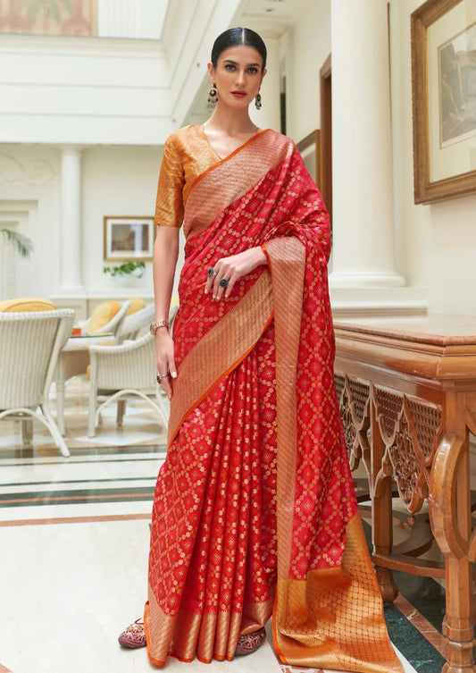 Banarasi silk red bandhani saree with orange blouse online.