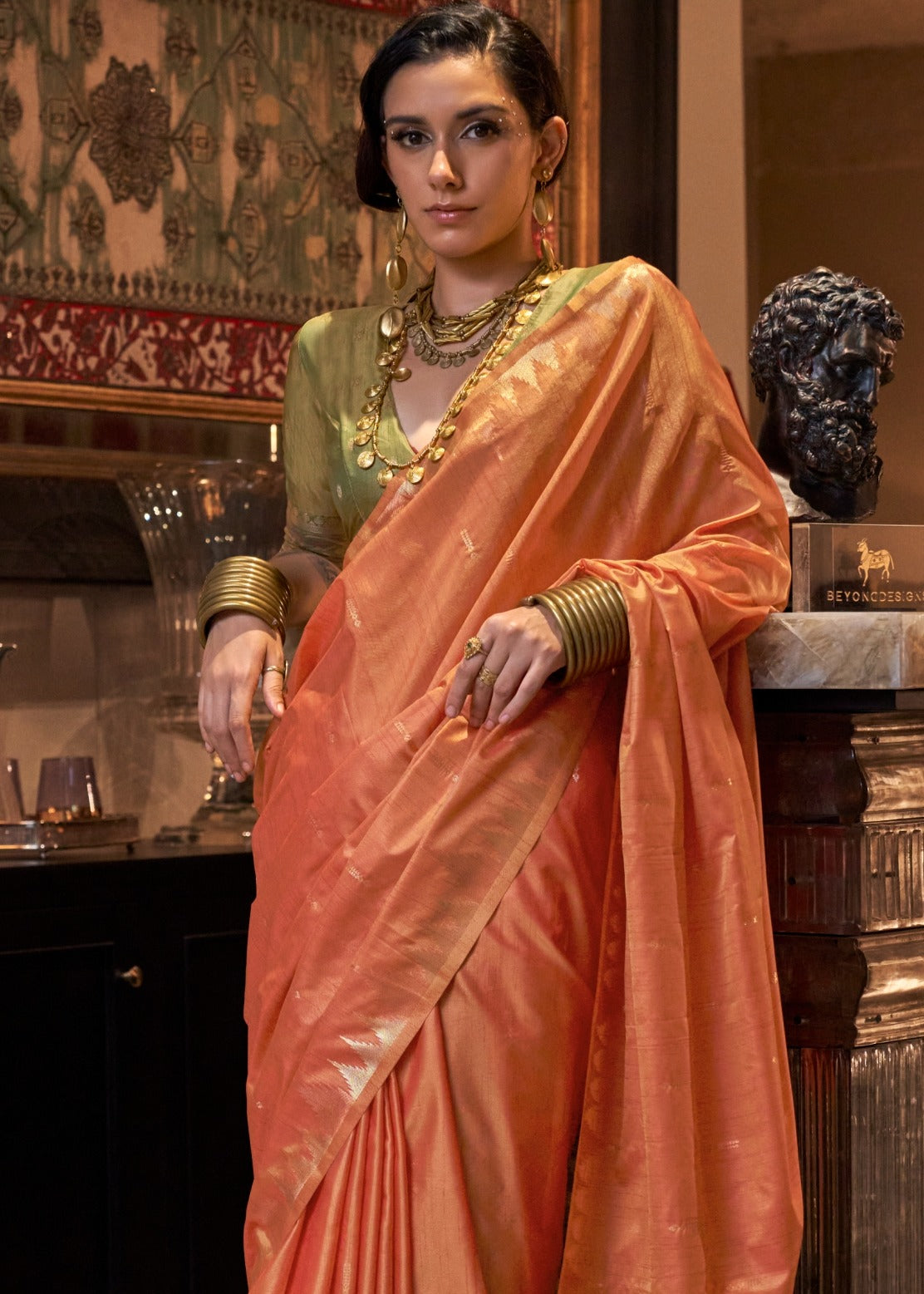 Banarasi tussar silk saree online in light orange colour with green blouse.