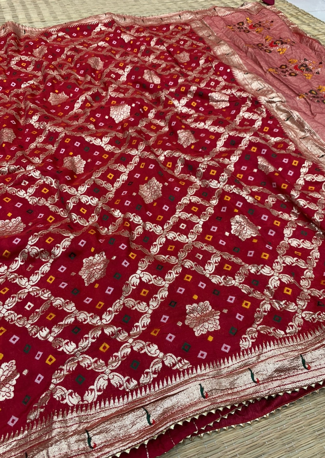 Shop bandhani georgette saree with paithani border online red color.