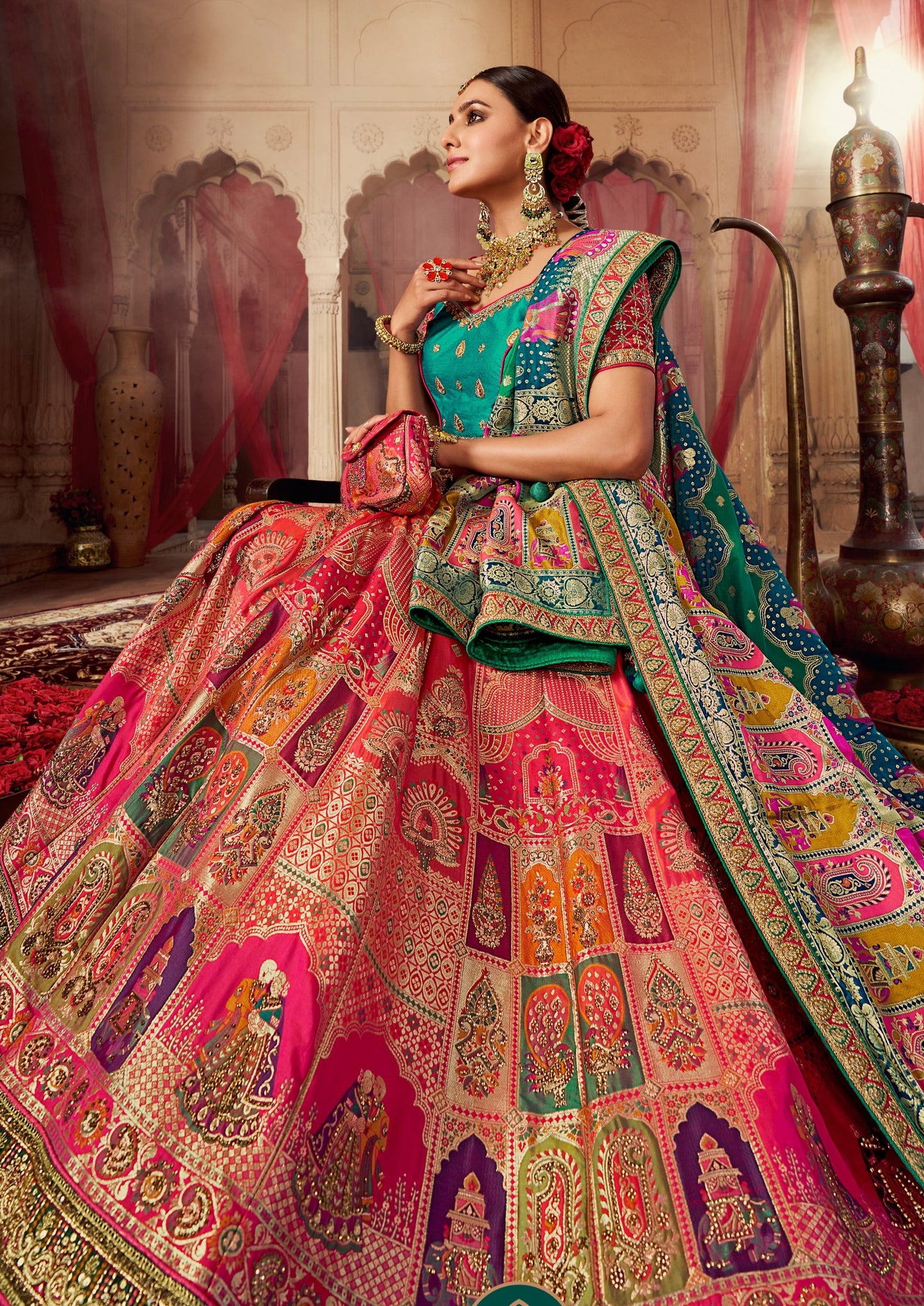 Bride in pink and blue combination banarasi silk lehenga choli with dupatta.