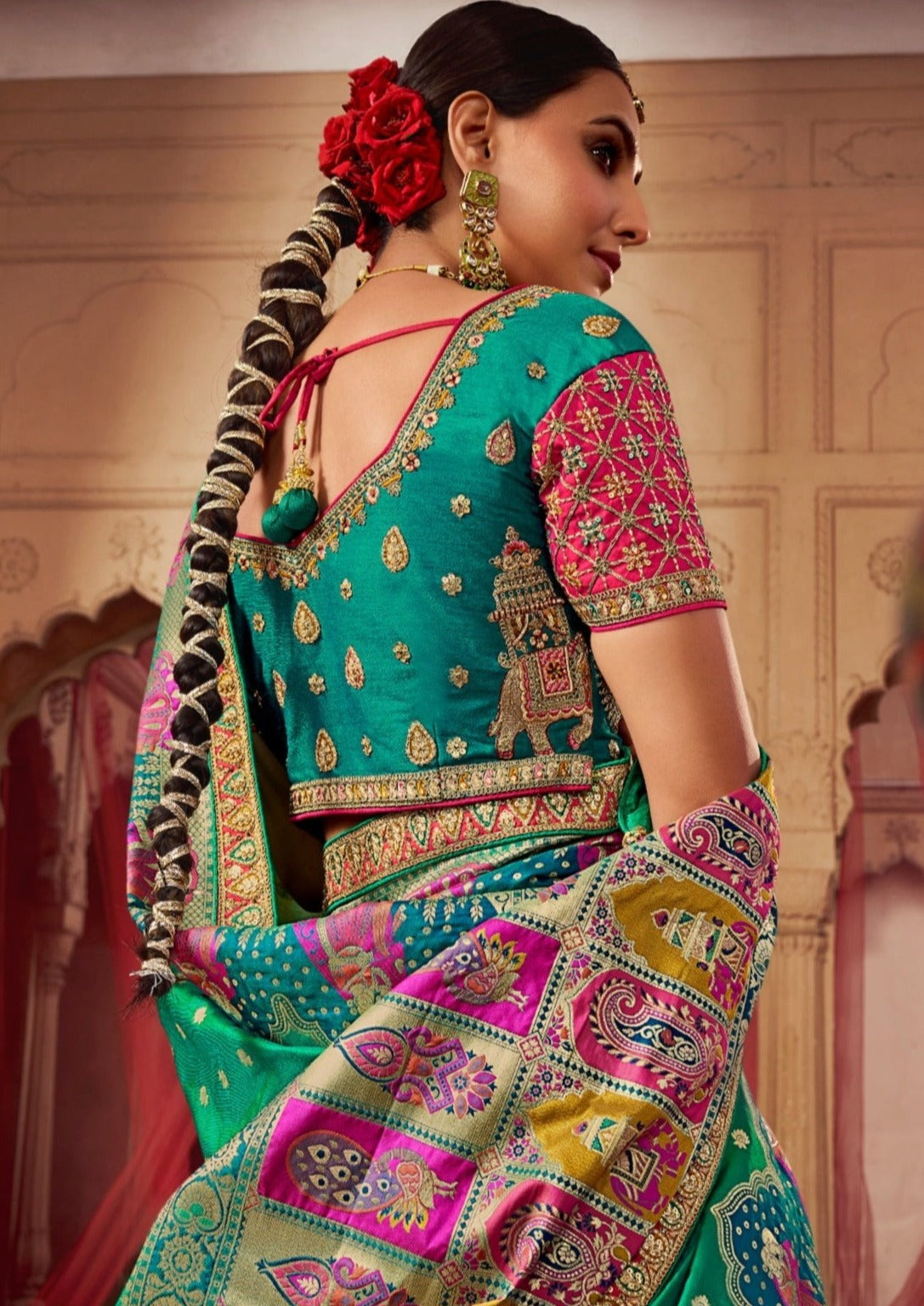 Bride in blue banarasi silk lehenga choli with dupatta.