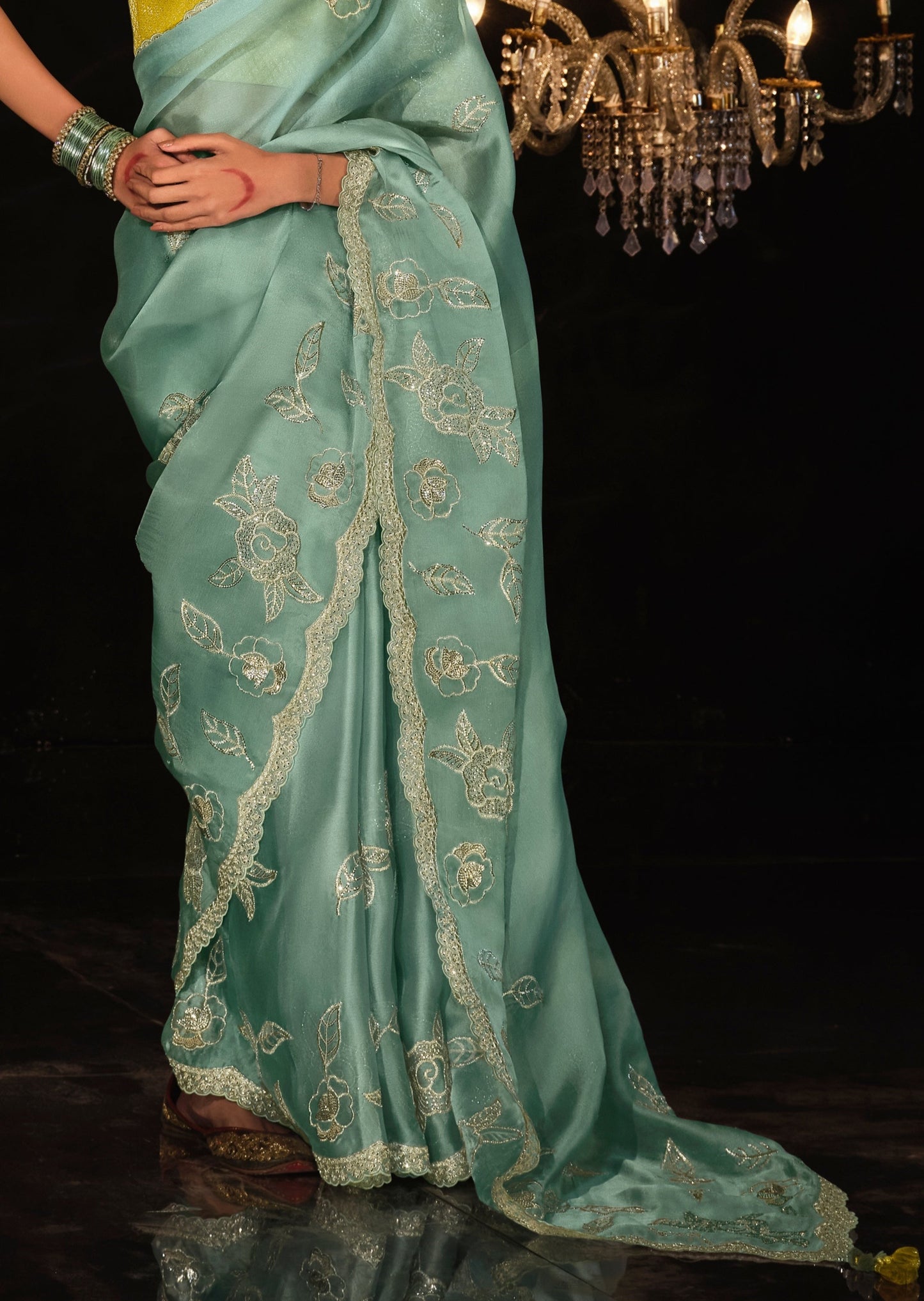 Hand embroidery work sky blue organza saree online shopping with price.
