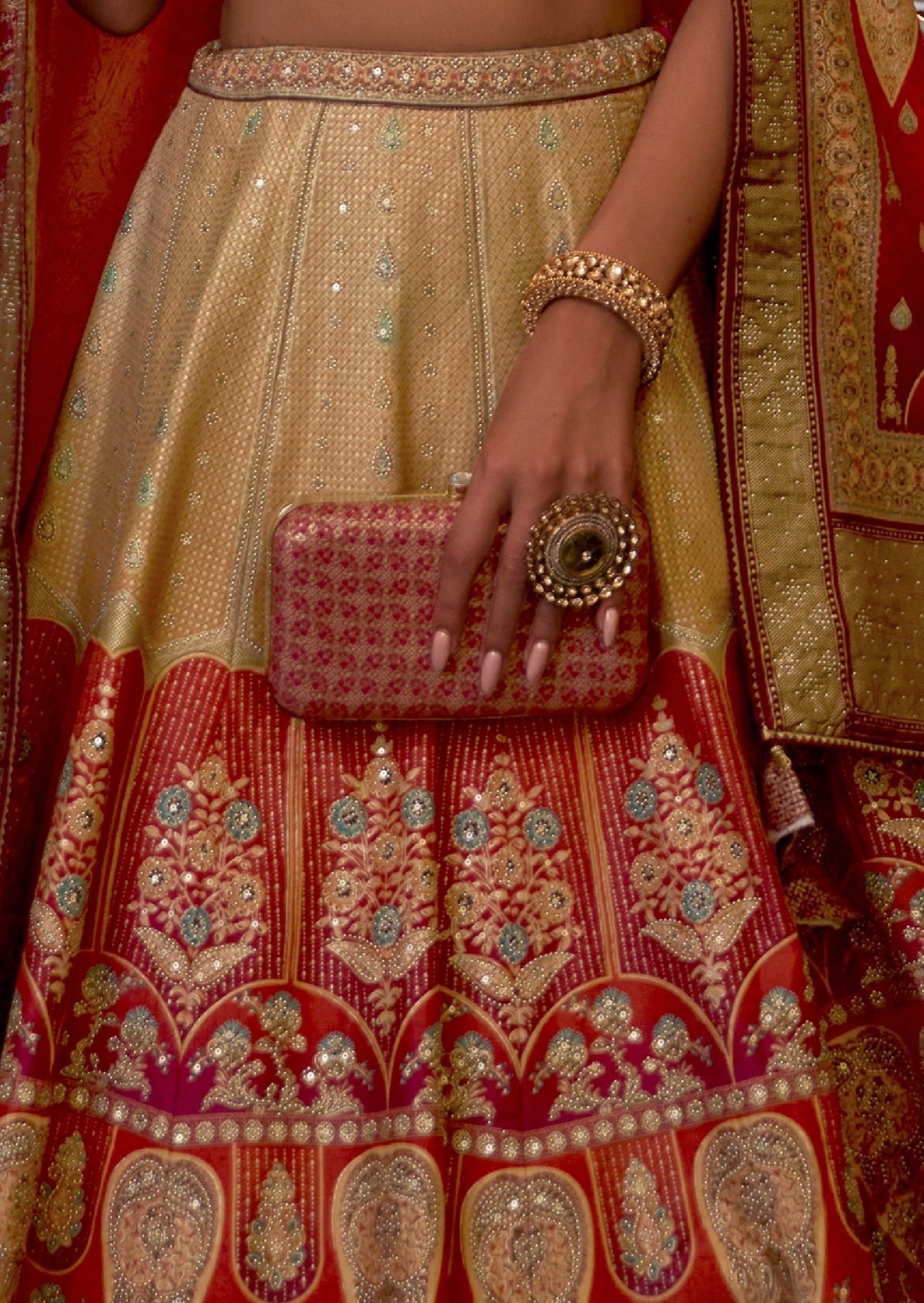 Embroidery work on golden lehenga