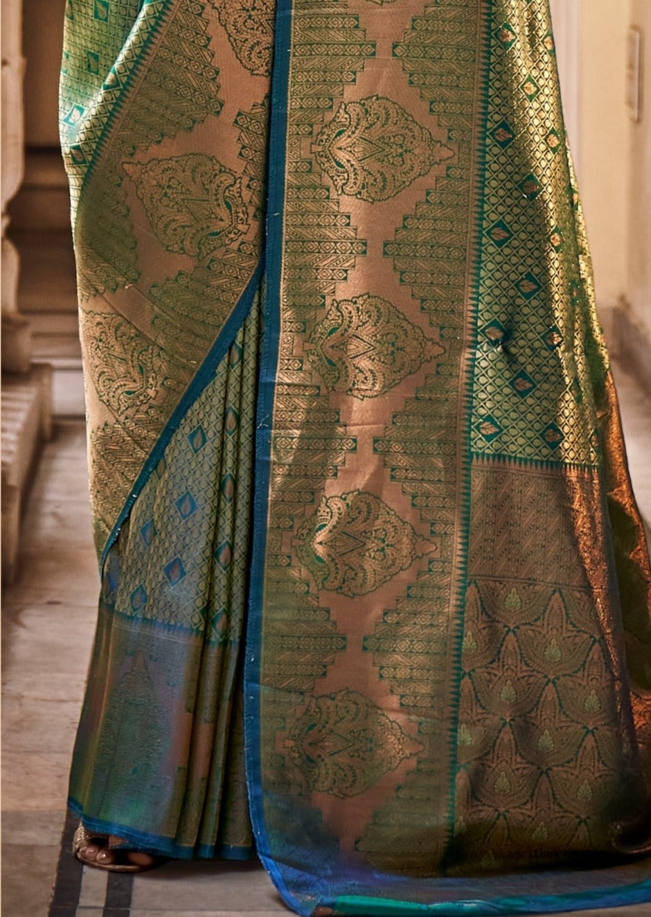 Green kanjivaram silk saree india usa online shopping price for bride in traditional designs.