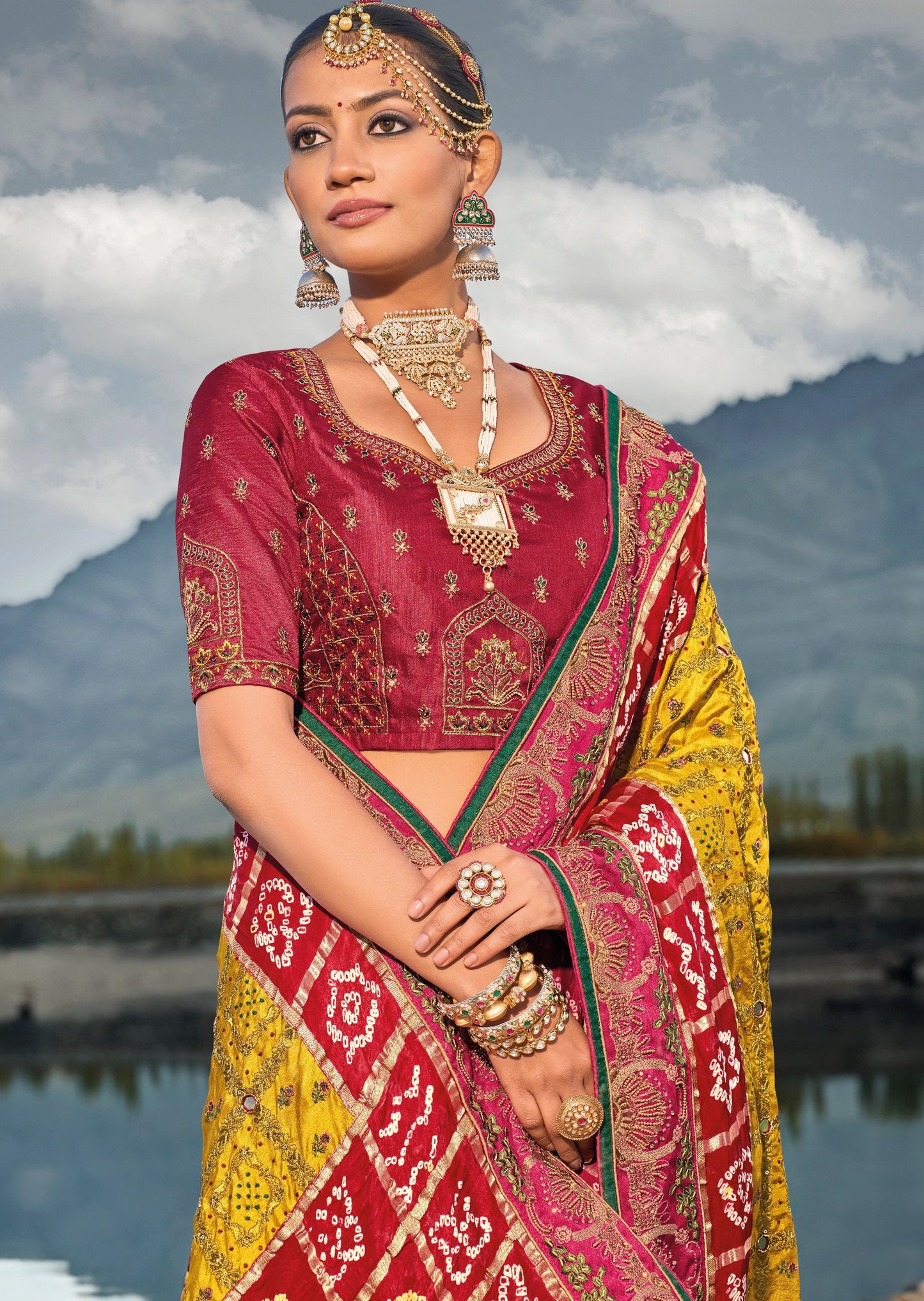 Hand embroidery kutch mirror work banarasi silk bandhej gujarati saree online.