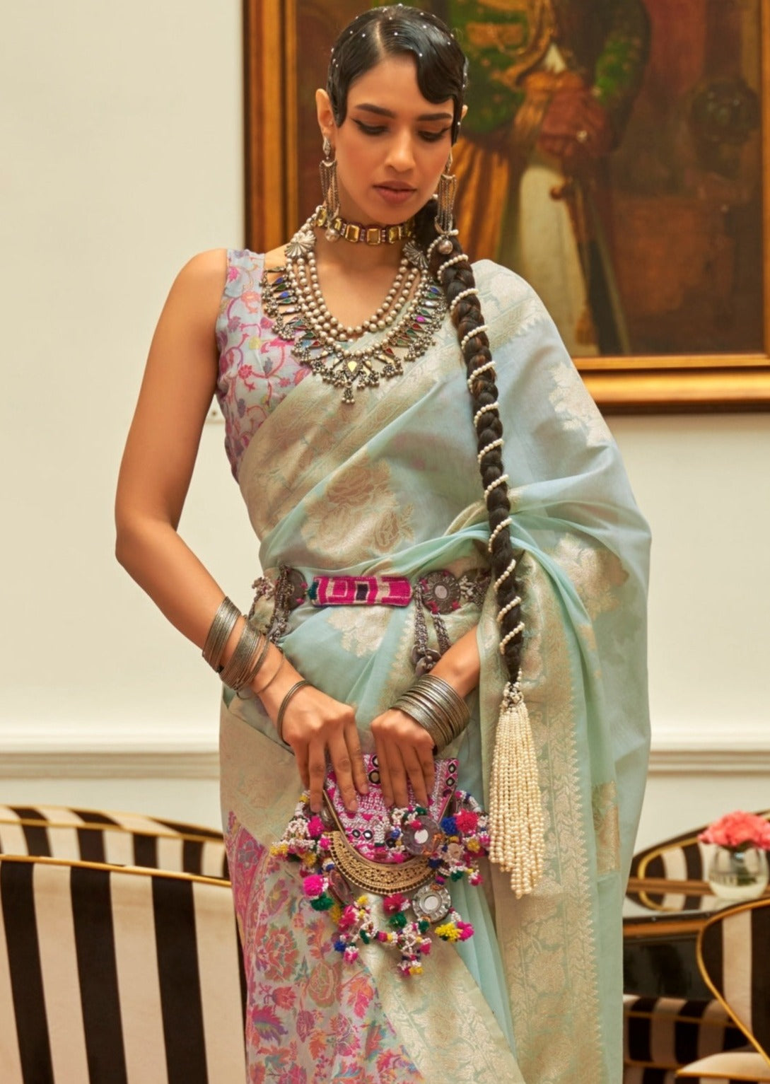 Woman in Kashmiri Silk saree looking down