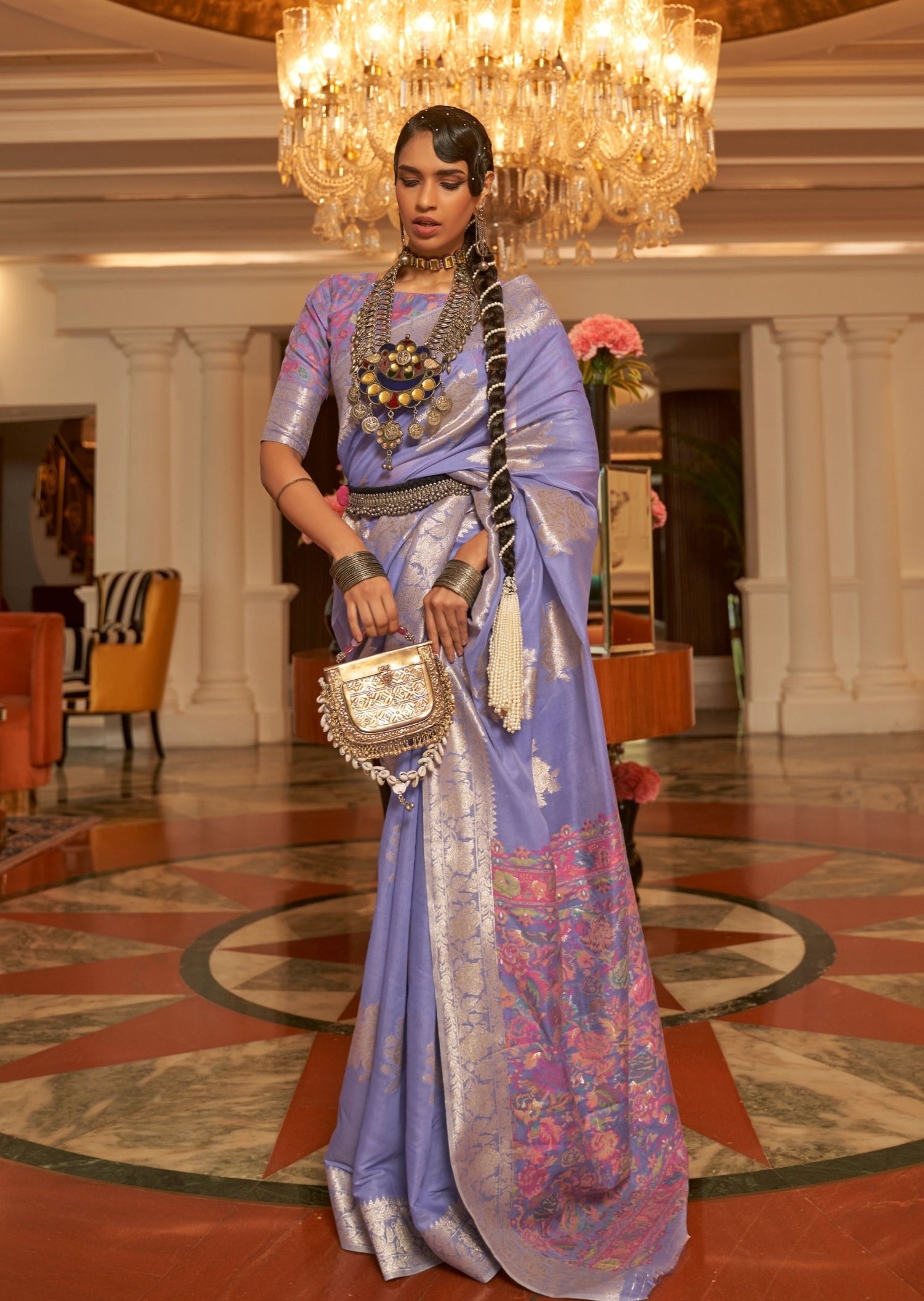 Woman standing in Handloom Kashmiri Banarasi Silk Purple saree blouse