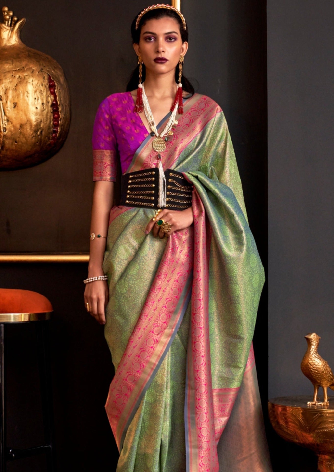 Kanjivaram silk green saree contrast pink blouse online.