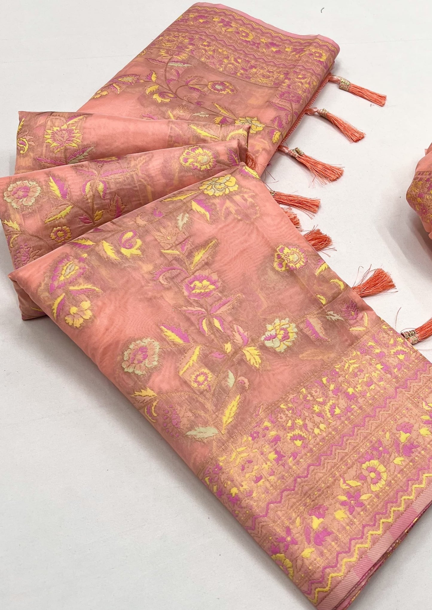 Kashmiri organza embroidered bridal saree online shopping for wedding in peach color.