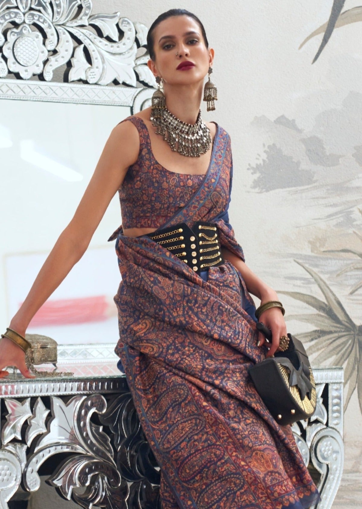 Woman in blue kashmiri Silk handloom saree blouse.