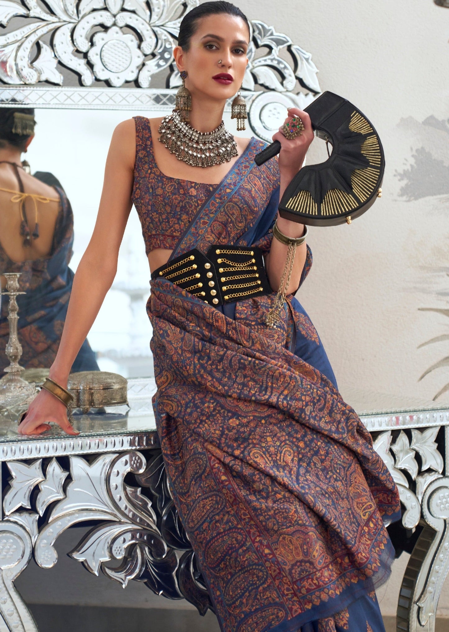 Bride in kashmiri silk blue bridal handloom saree blouse.