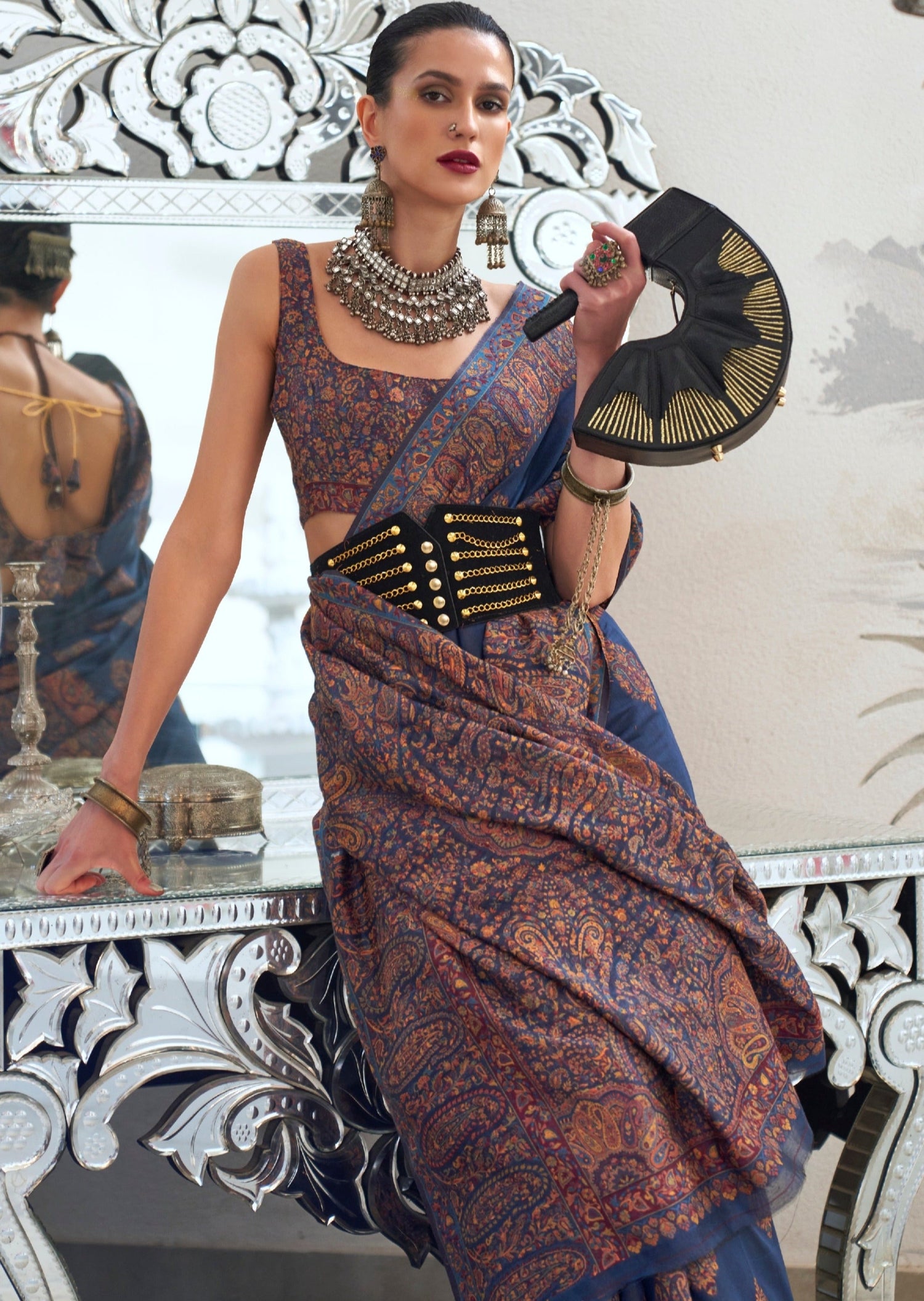 Bride in kashmiri silk blue bridal handloom saree blouse.