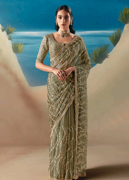 Luxury olive green organza tissue silk hand embroidered bridal saree with beadwork and sequins embroidery for wedding, reception nights and festive occasions.