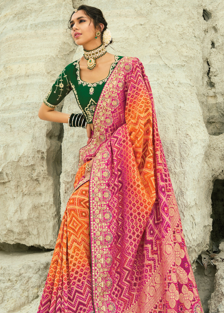 Designer bandhej saree online in orange pink ombre georgette with artisan embroidery for weddings and festive wear.