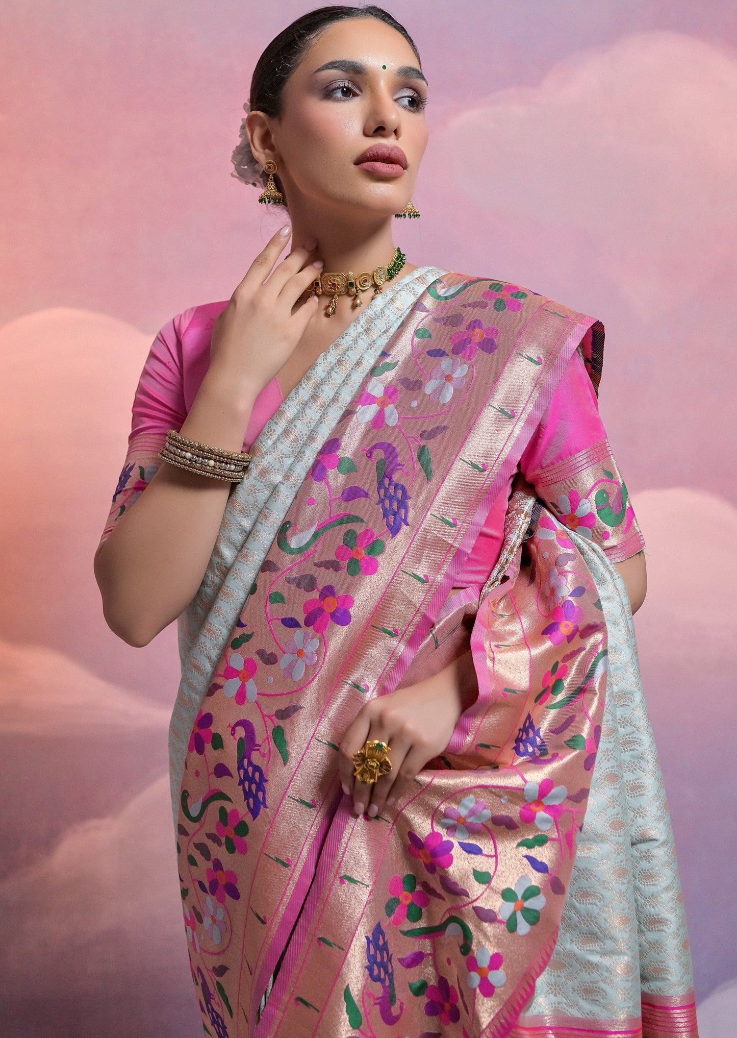 Pastel blue triple muniya border paithani silk handloom saree.