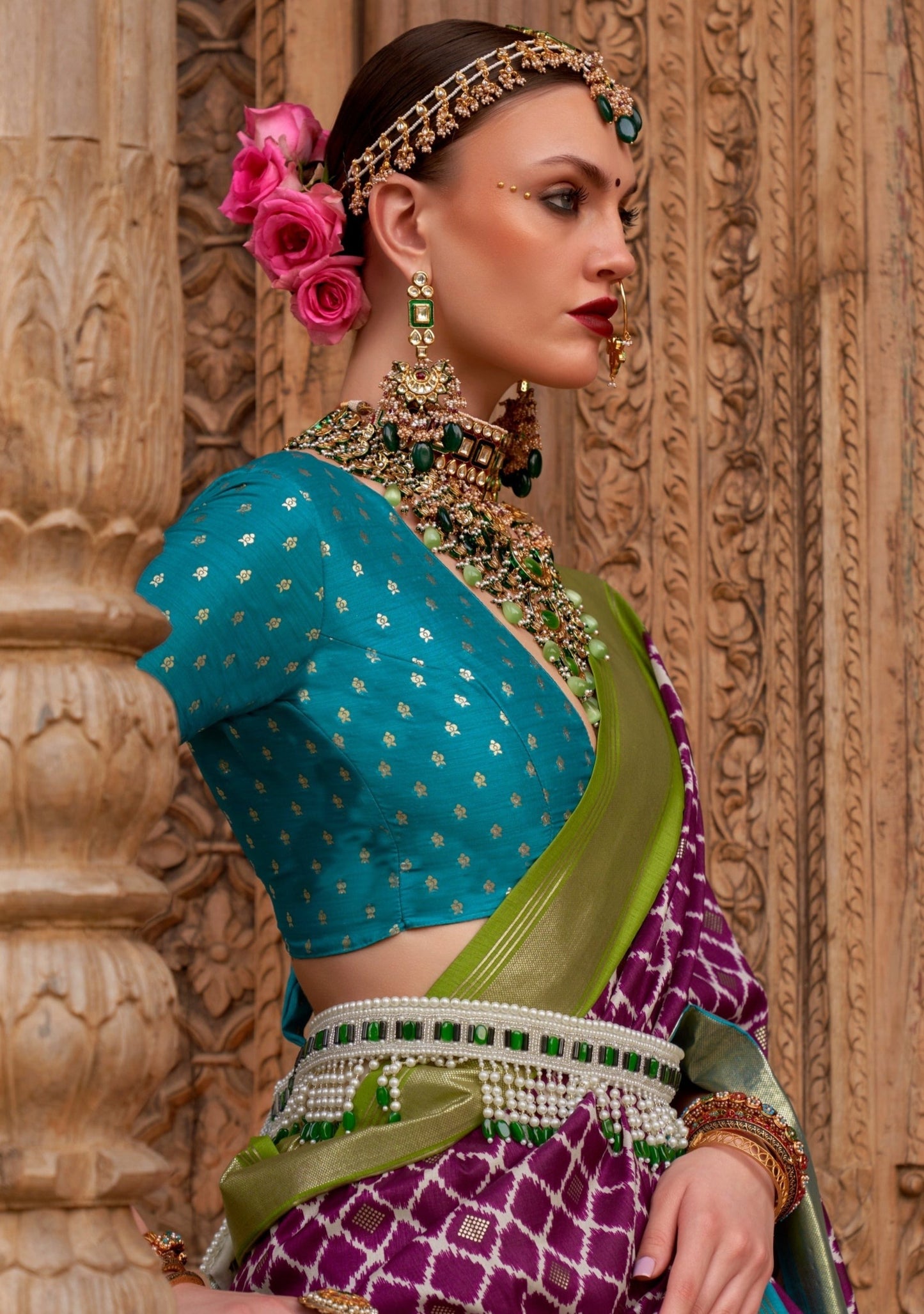 Purple patola saree & blue blouse online for wedding.