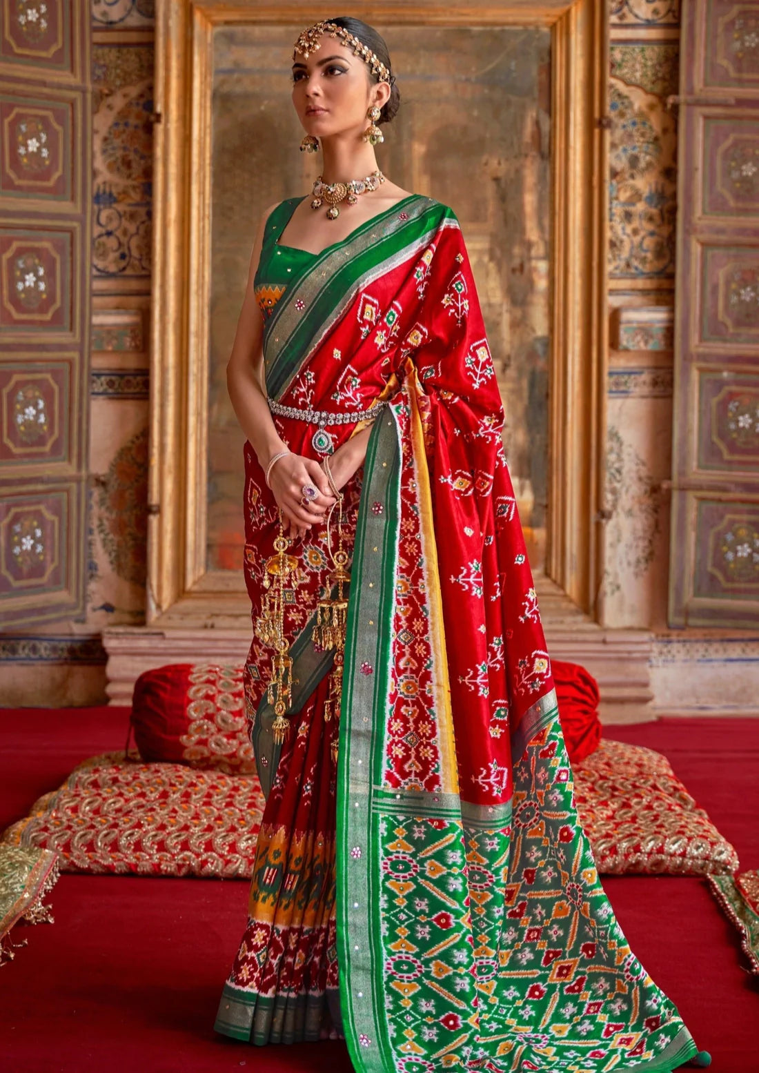 Patan patola silk mirror khatli hand work red ikat saree online usa price.