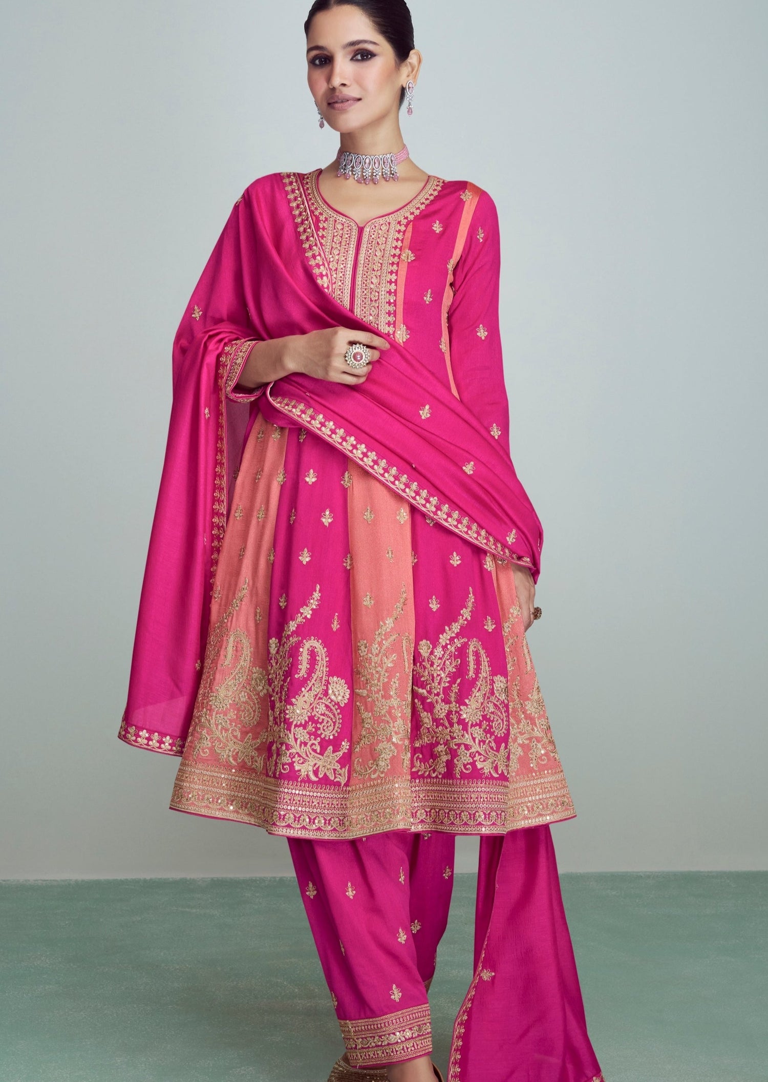 Bride in pink silk suit pant style