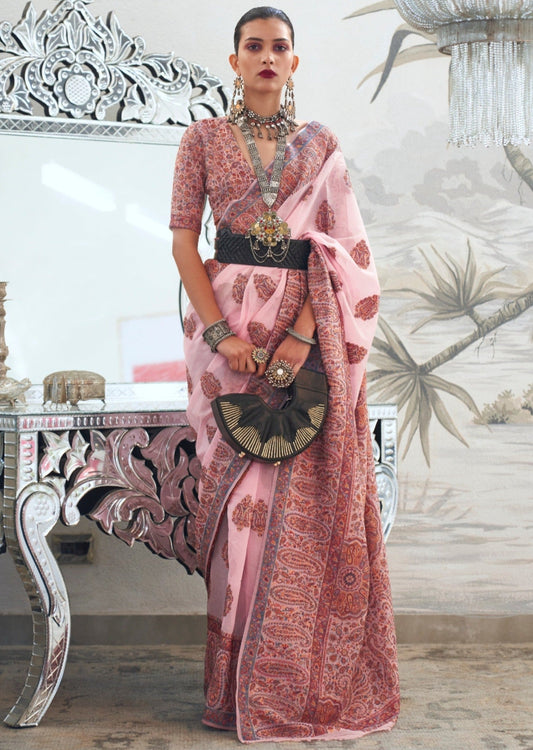 Woman in pink kashmiri silk bridal handloom saree blouse.