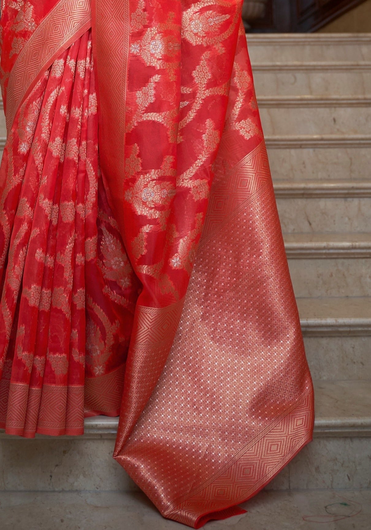 Red colour pure banarasi organza zari handloom saree pallu design.