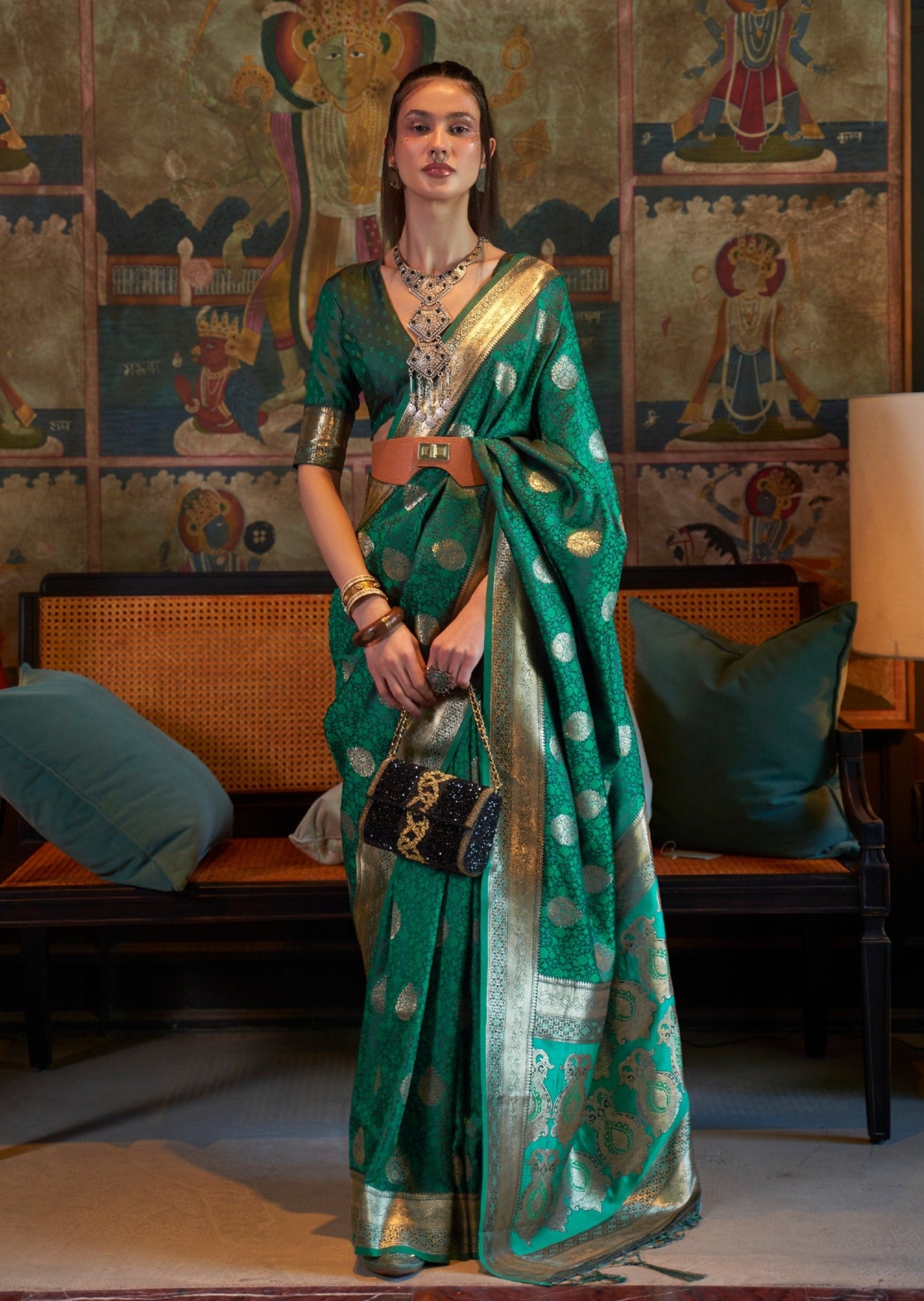 Women's green color pure banarasi satin silk saree online shopping india with price having gold zari woven border.
