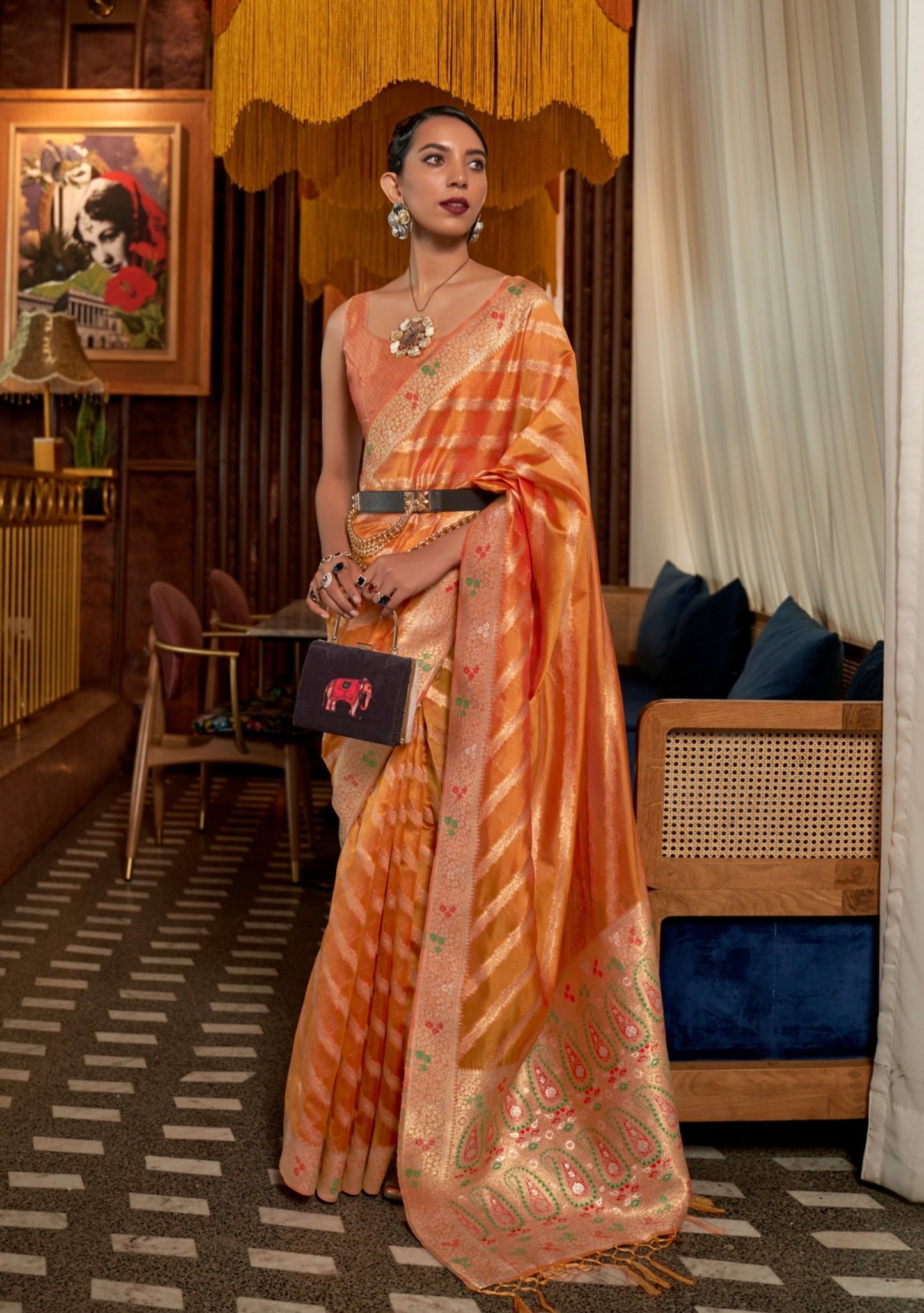 woman in Pure Handloom Banarasi Organza Saffron Orange Saree