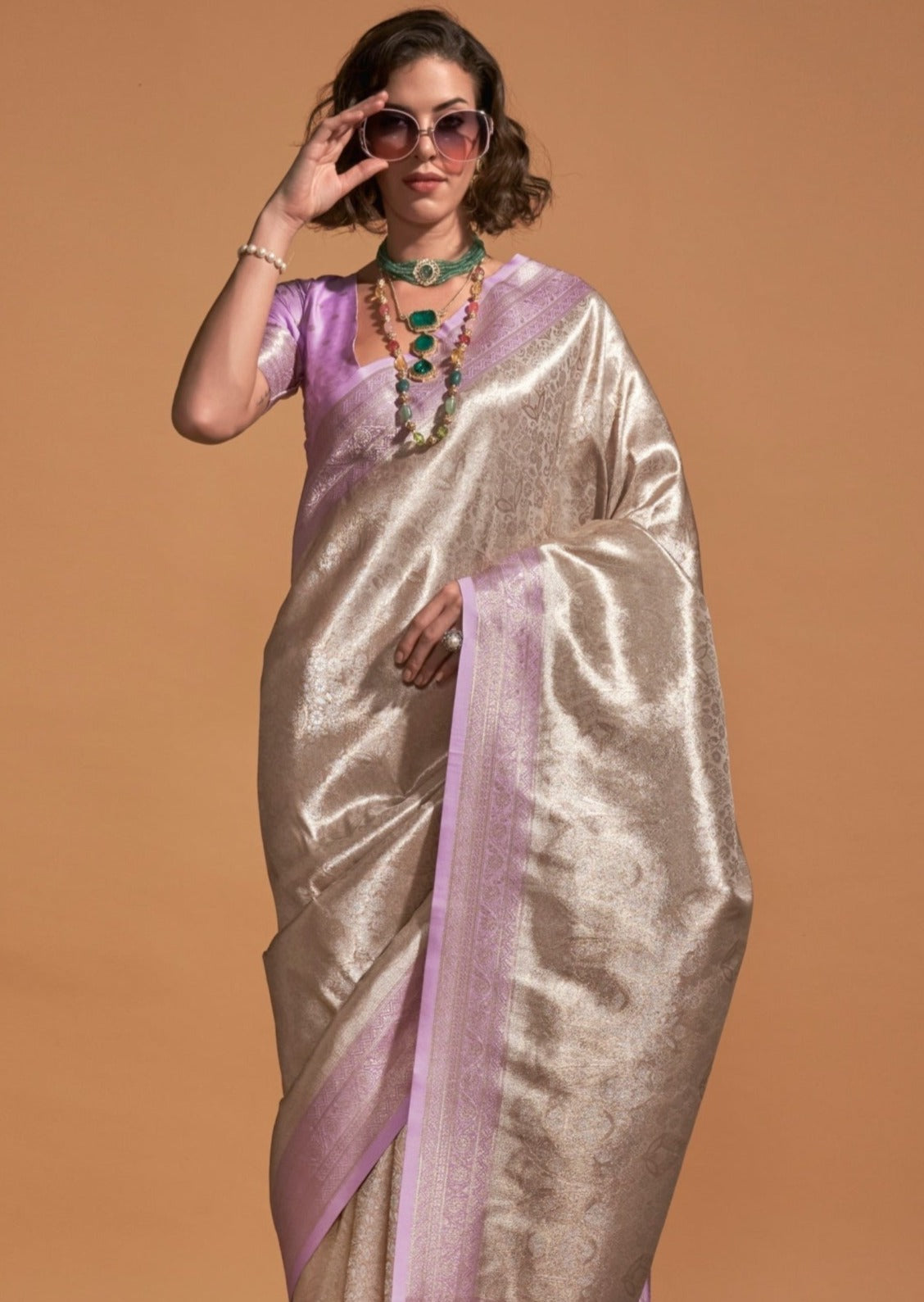 Pure handloom dual tone kanjivaram silk cream saree.