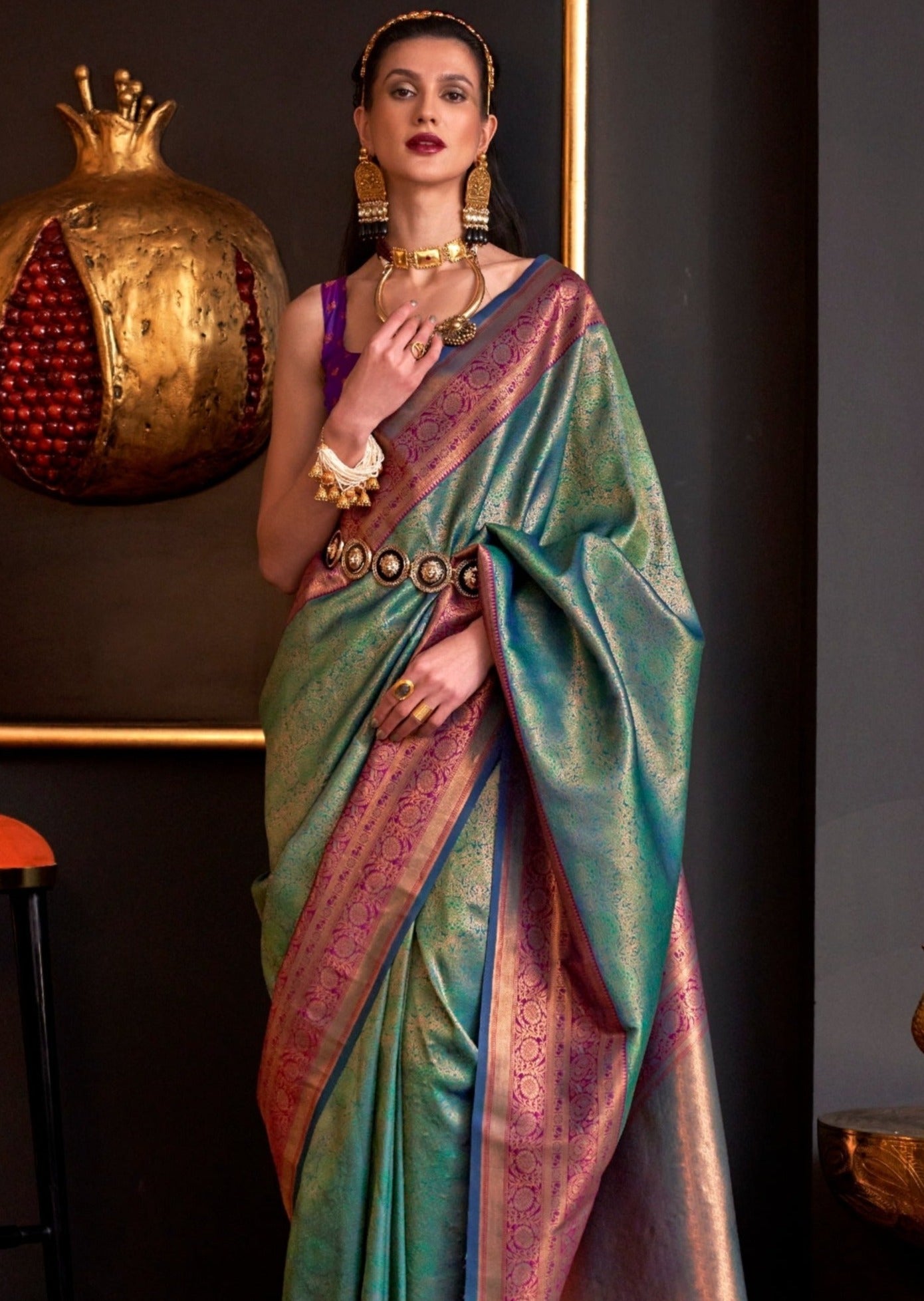 Pure handloom green kanjivaram silk saree contrast blouse.