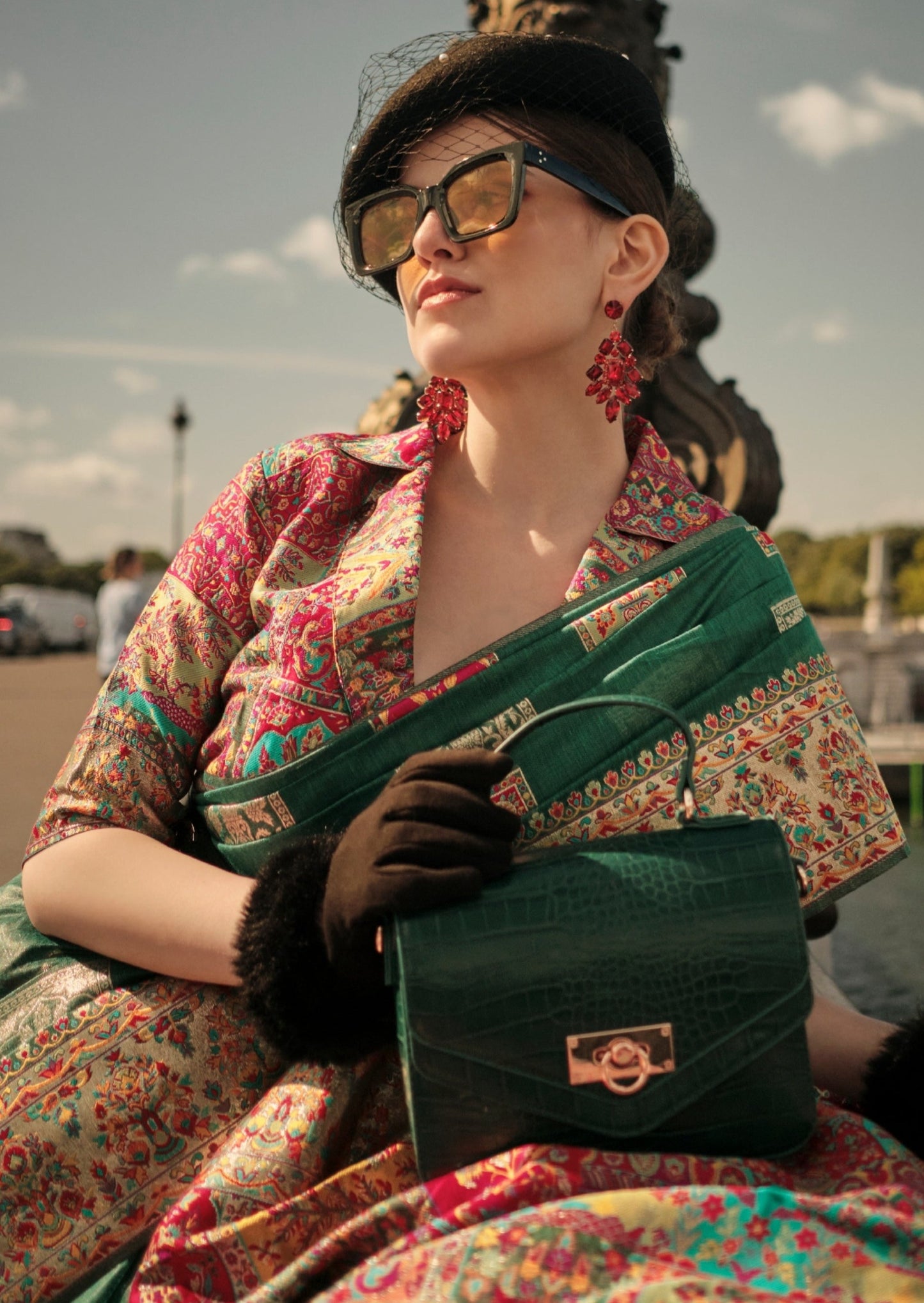 Pure handloom kashmiri silk embroidered dark green saree.