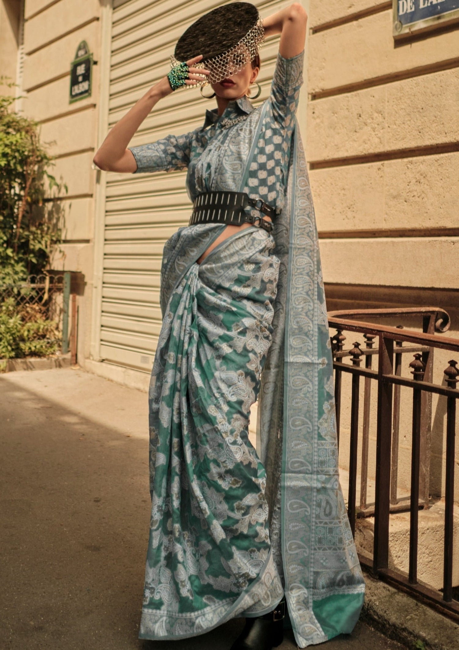 Woman in green organza lucknowi chikankari zari saree blouse.