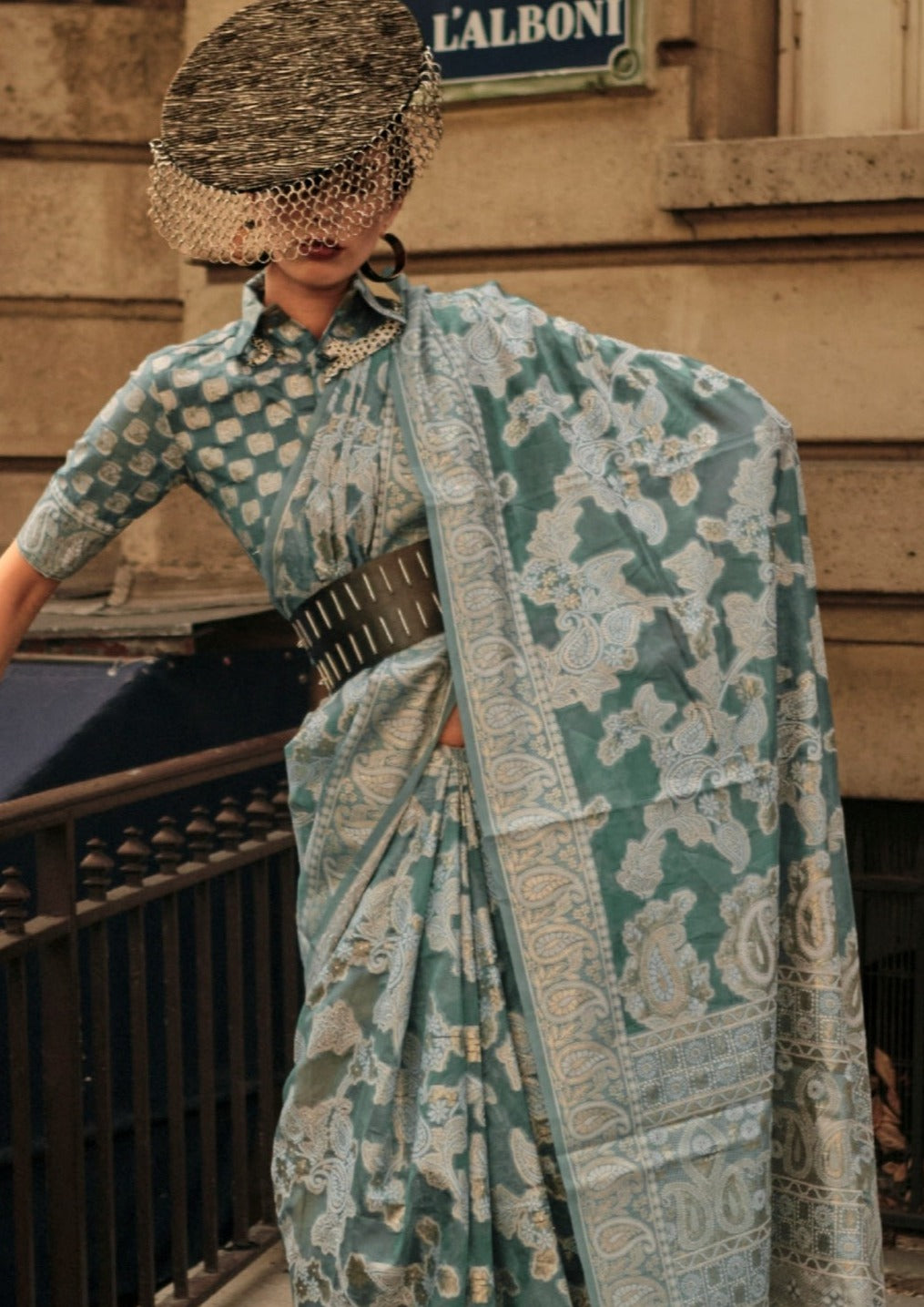 Bride in green color organza lucknowi chikankari saree blouse design.