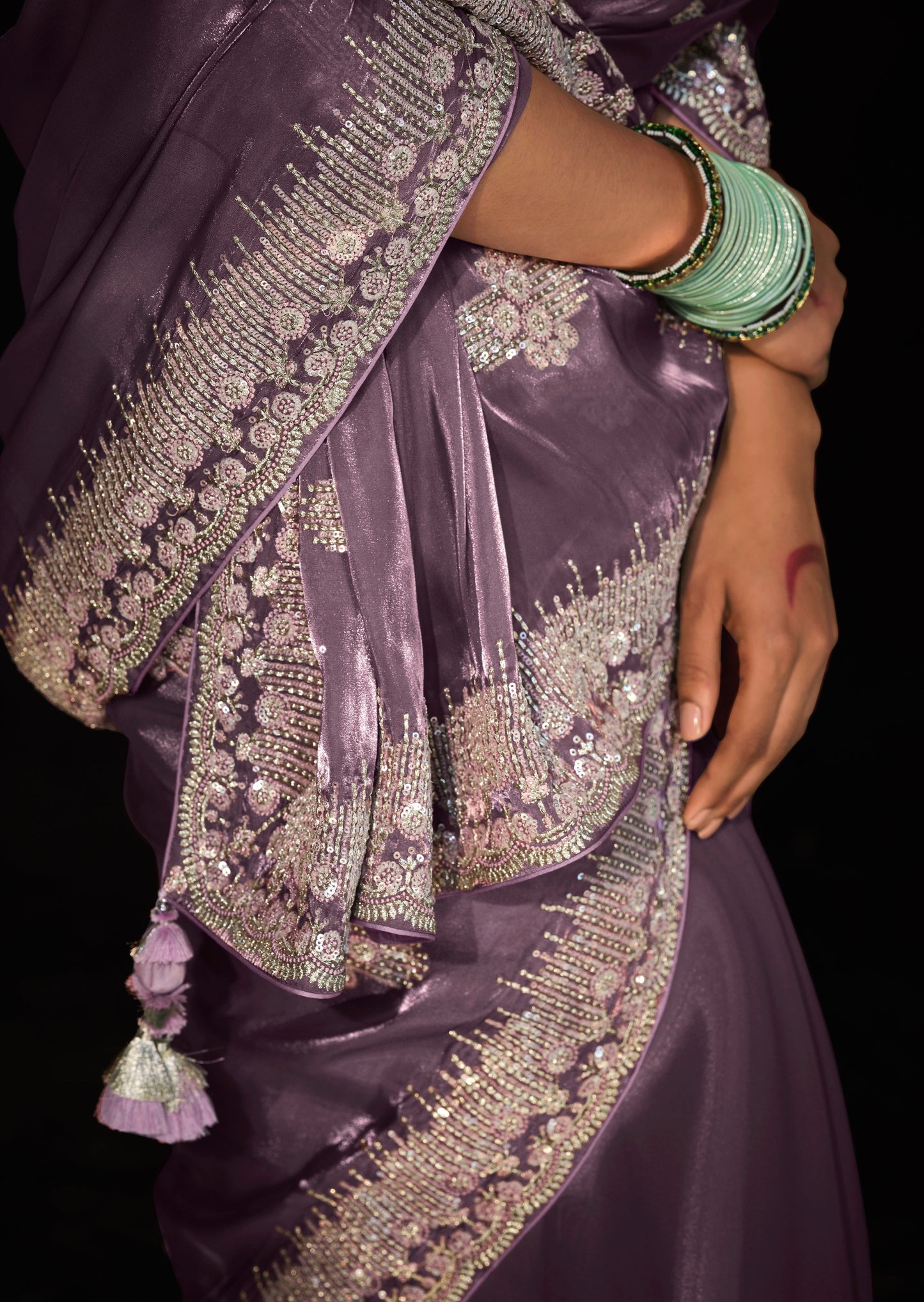 Purple organza saree with embroidery work online designs for wedding.