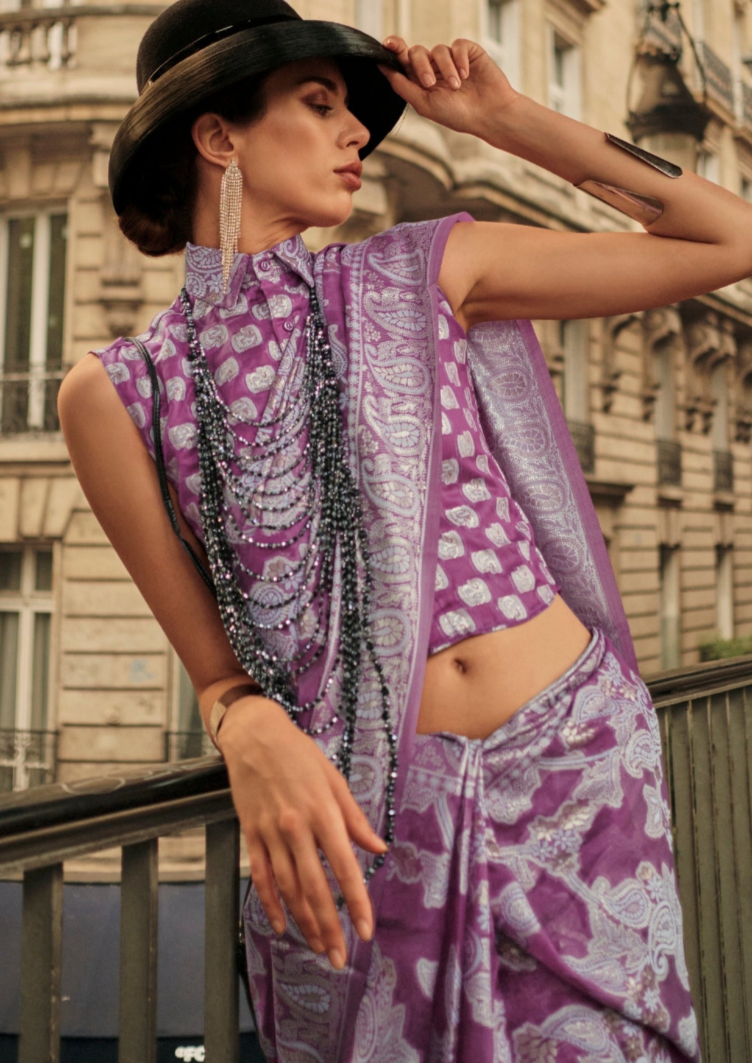 Woman in purple color organza lucknowi chikankari zari saree blouse.