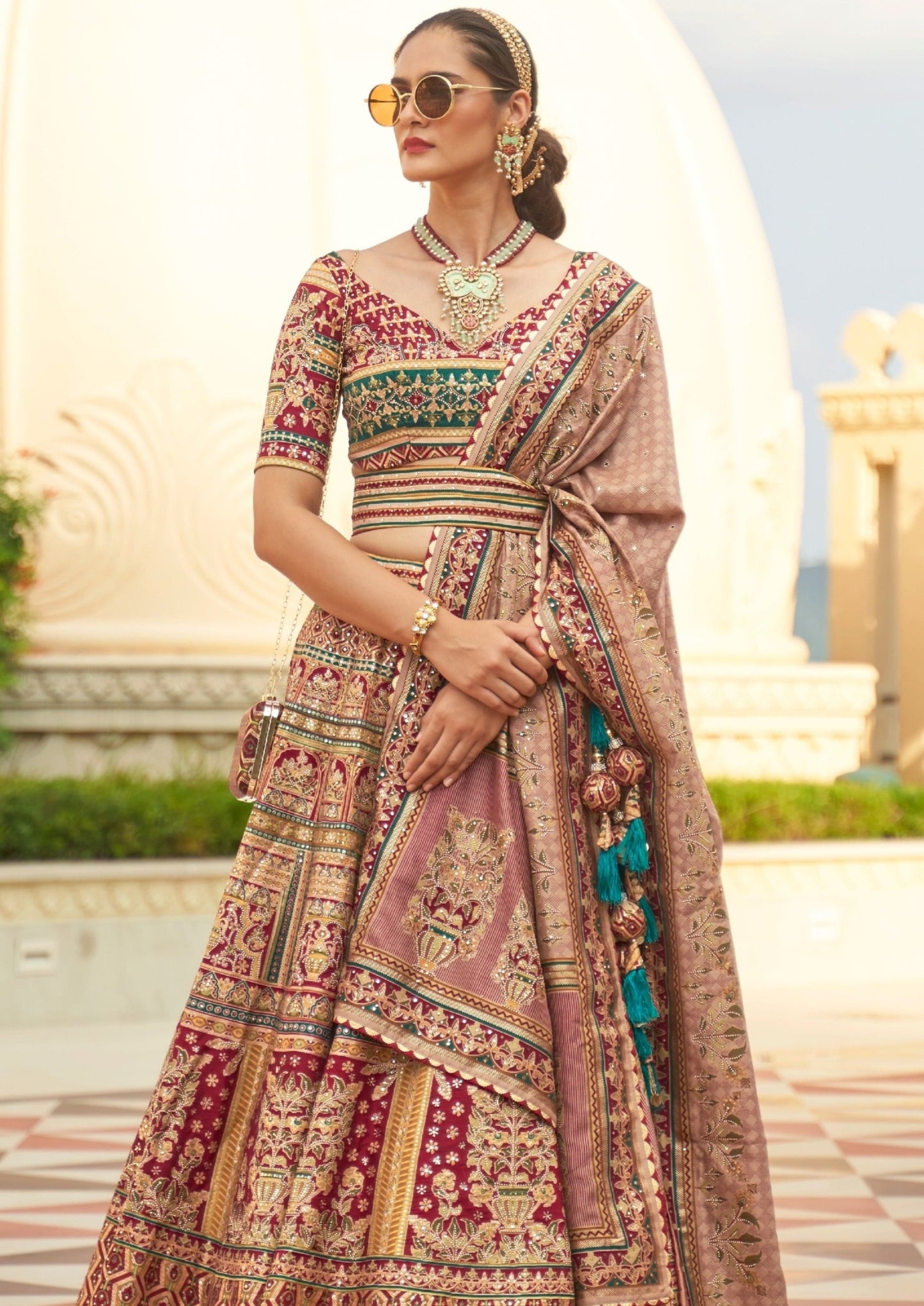 bride in bride in red and green lehenga choli blouse with dupatta