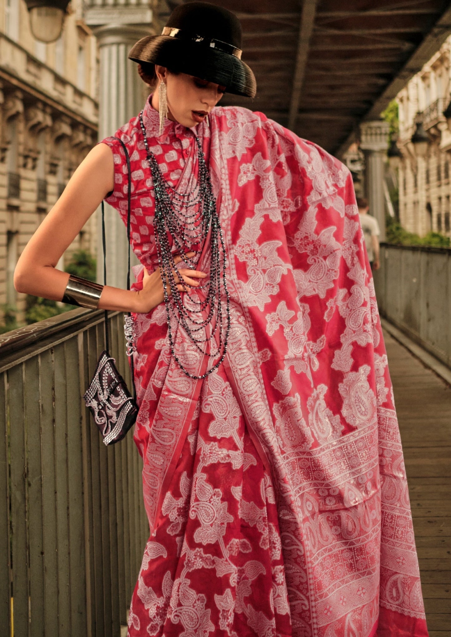 Woman in red color organza lucknowi chikankari saree blouse.