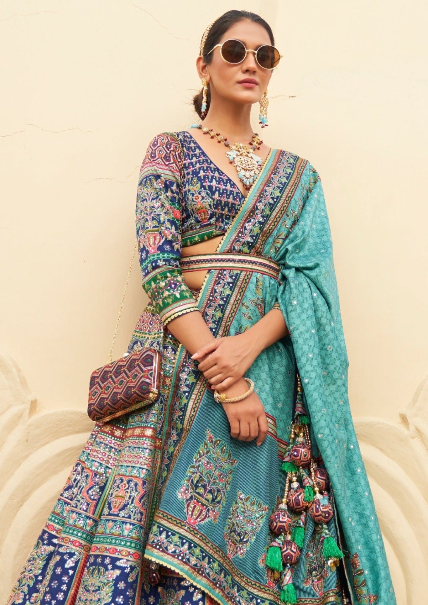 women in royal blue silk lehenga choli with dupatta